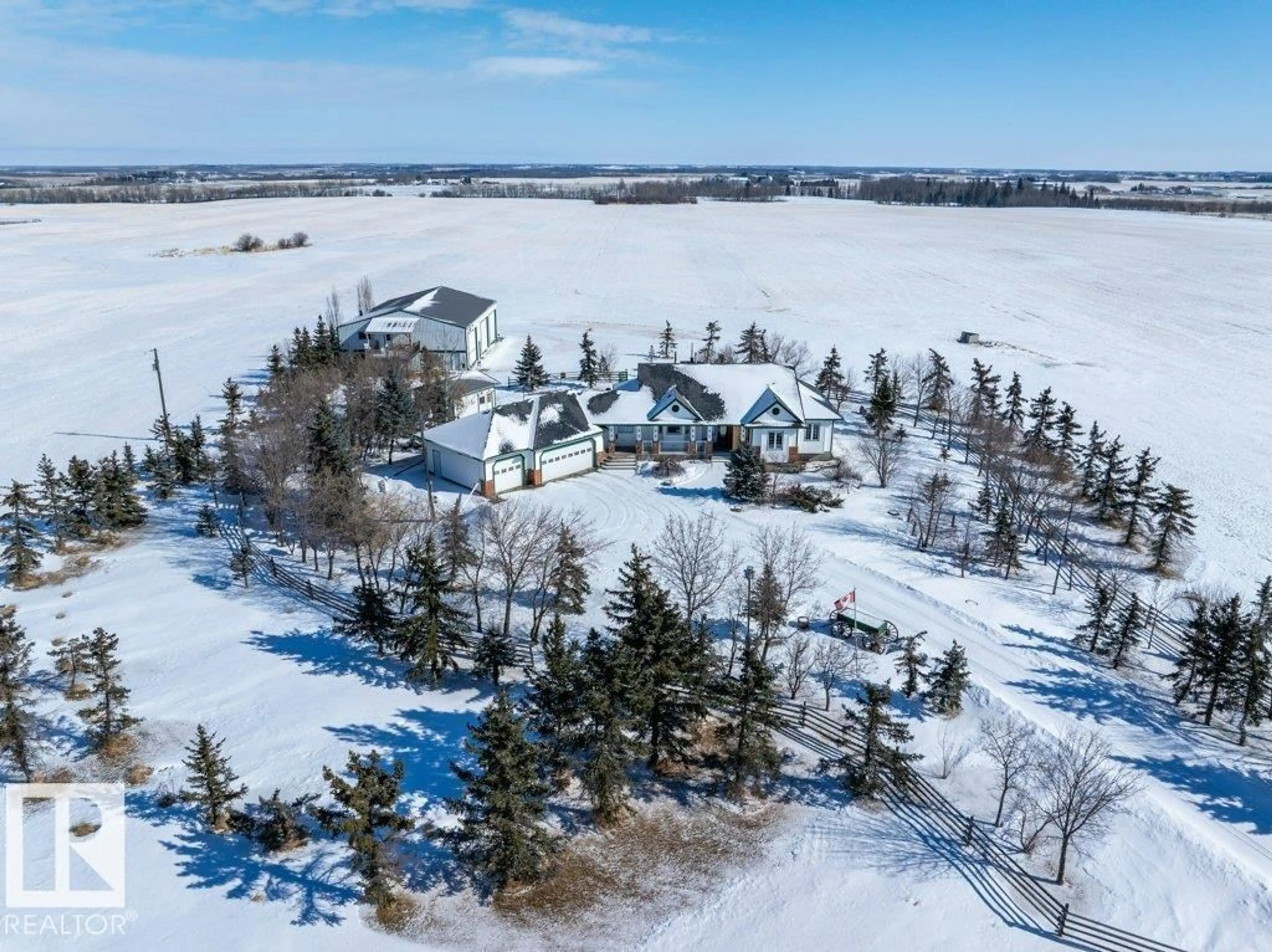 A pic from outside/outdoor area/front of a property/back of a property/a pic from drone, water/lake/river/ocean view for 49317 RGE RD 245, Rural Leduc County Alberta T4X2P8