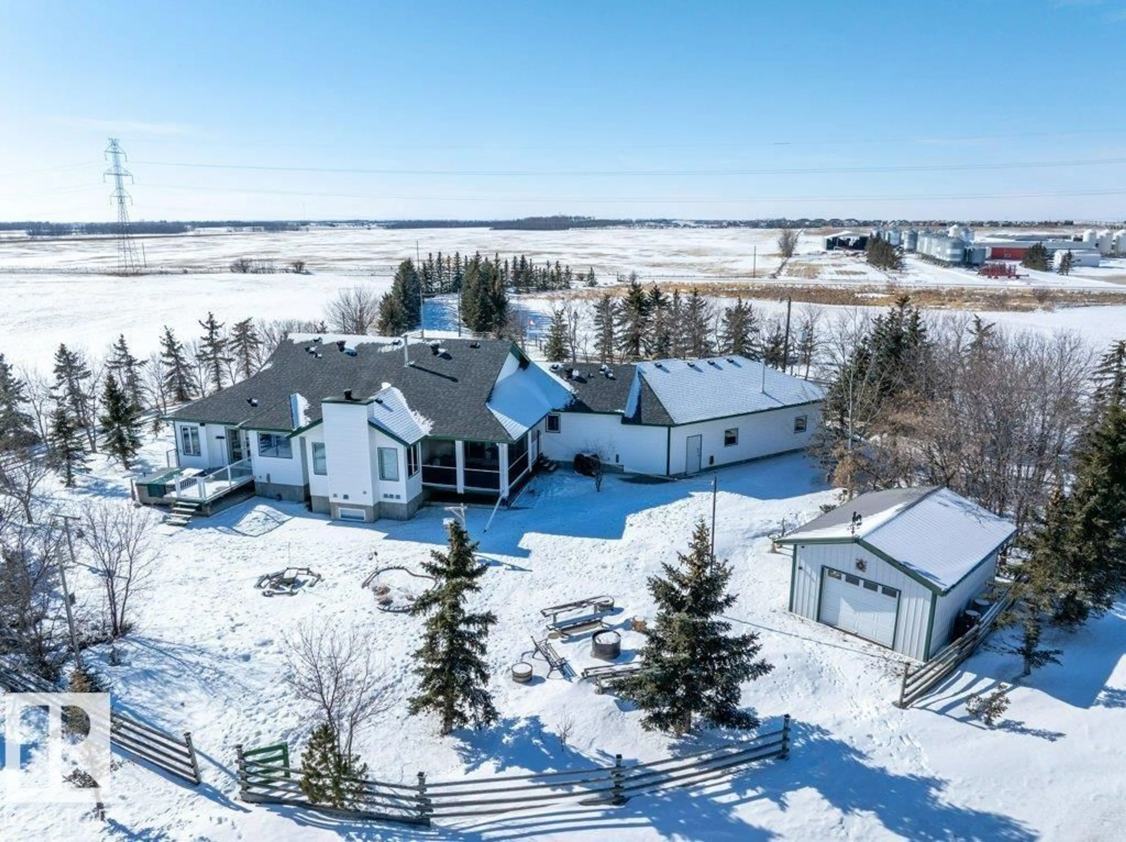 A pic from outside/outdoor area/front of a property/back of a property/a pic from drone, unknown for 49317 RGE RD 245, Rural Leduc County Alberta T4X2P8