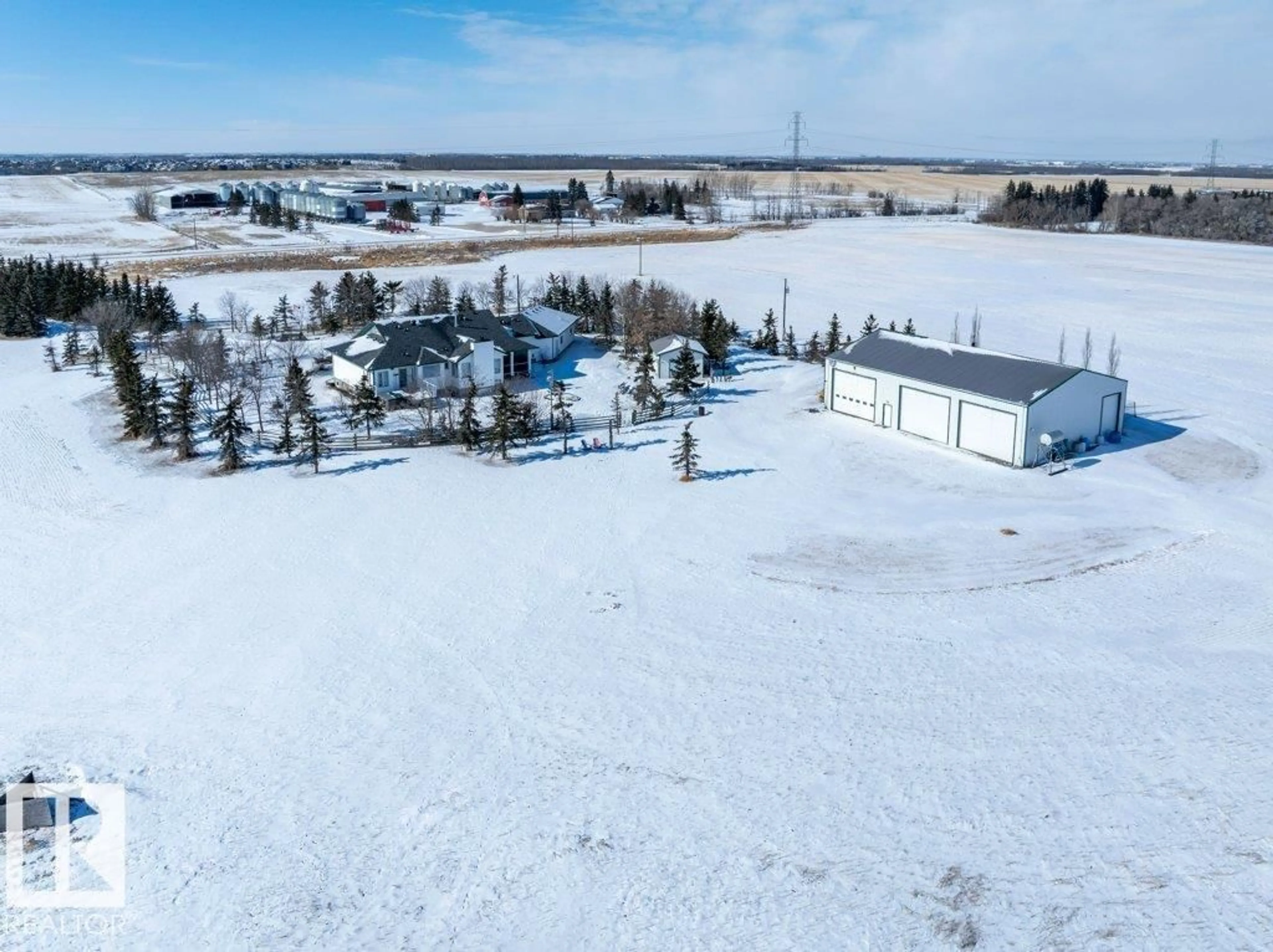 A pic from outside/outdoor area/front of a property/back of a property/a pic from drone, mountain view for 49317 RGE RD 245, Rural Leduc County Alberta T4X2P8