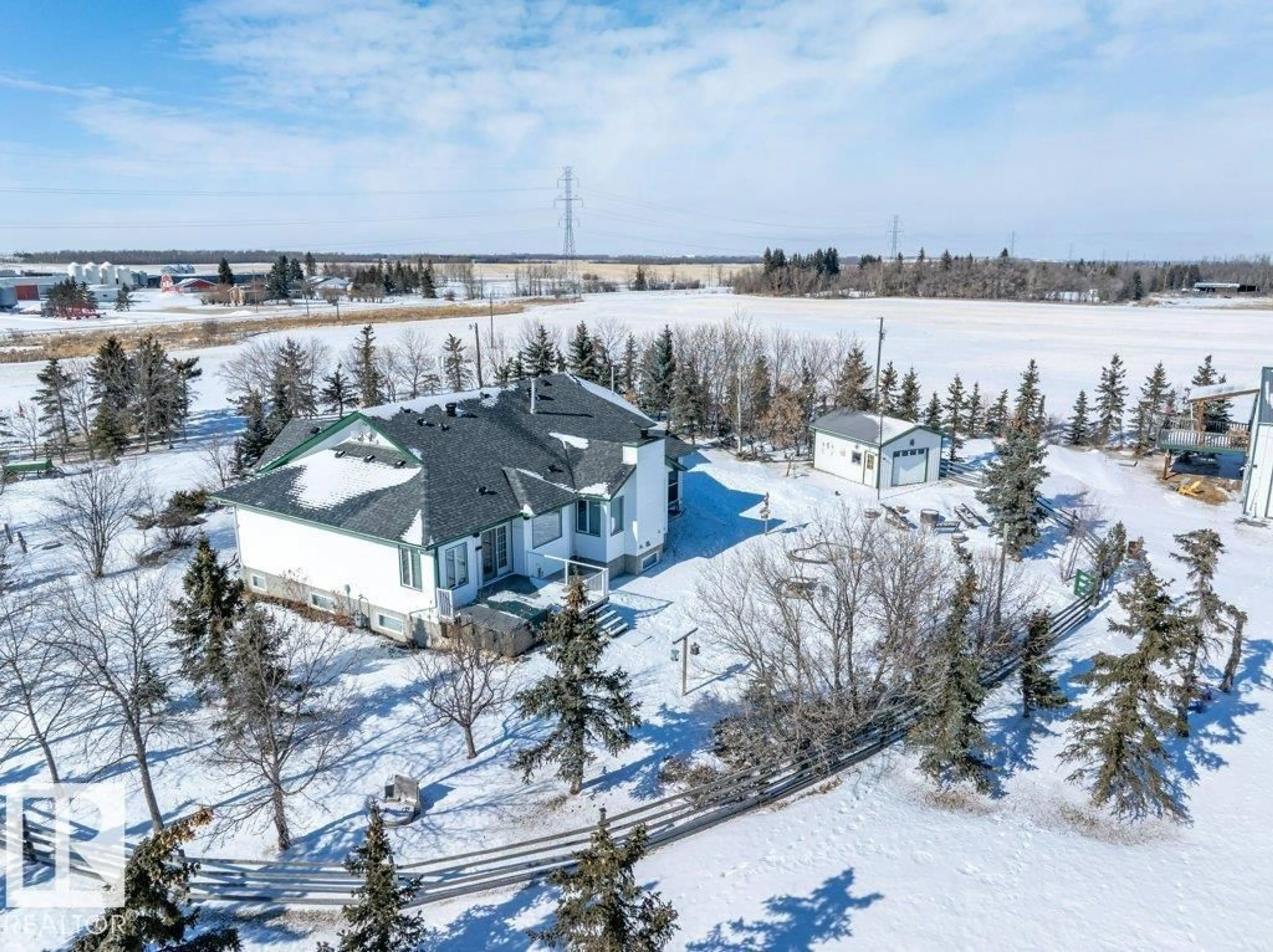 A pic from outside/outdoor area/front of a property/back of a property/a pic from drone, unknown for 49317 RGE RD 245, Rural Leduc County Alberta T4X2P8