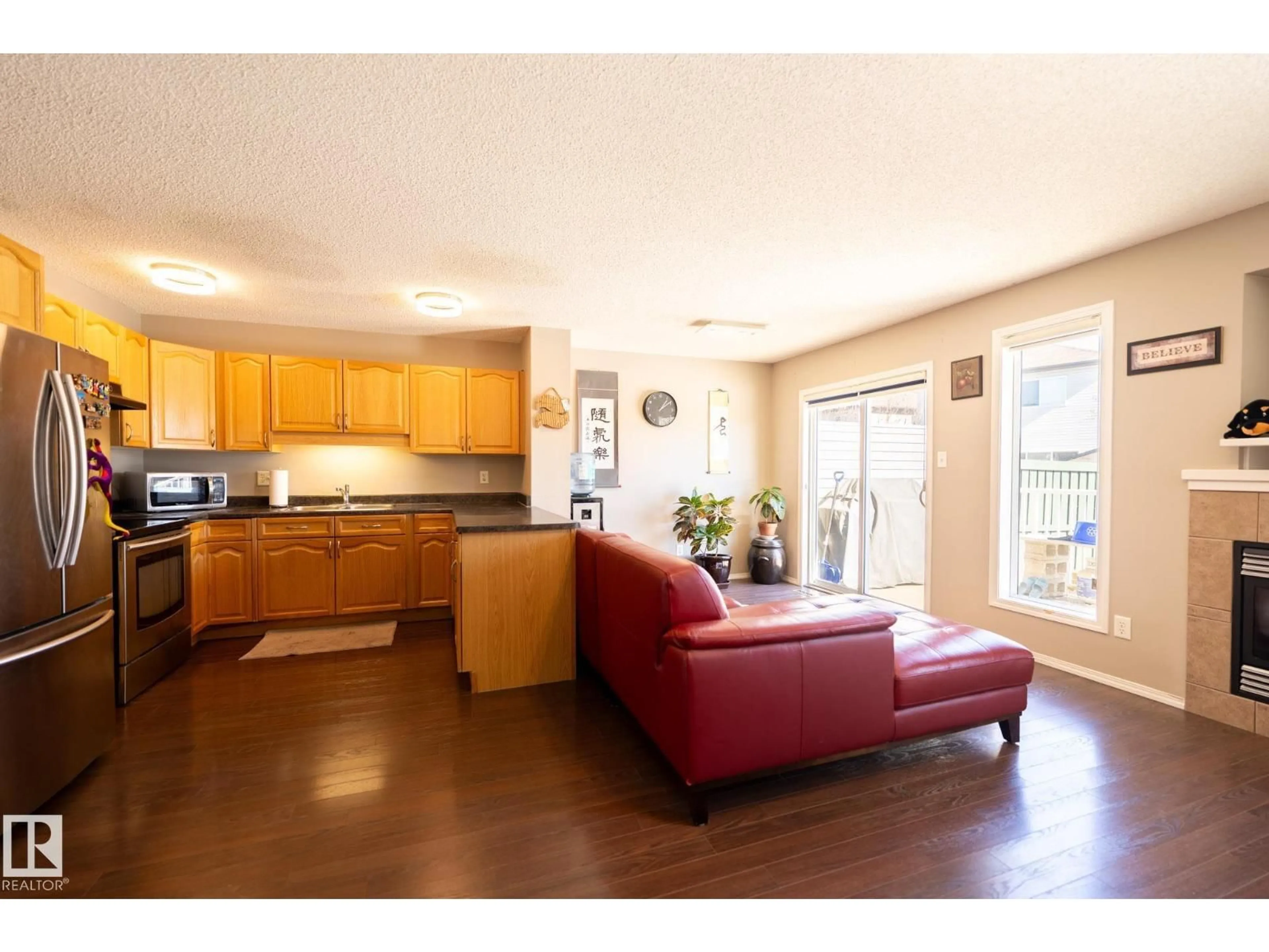 Open concept kitchen, wood/laminate floor for 1863 119 ST, Edmonton Alberta T6W1W4