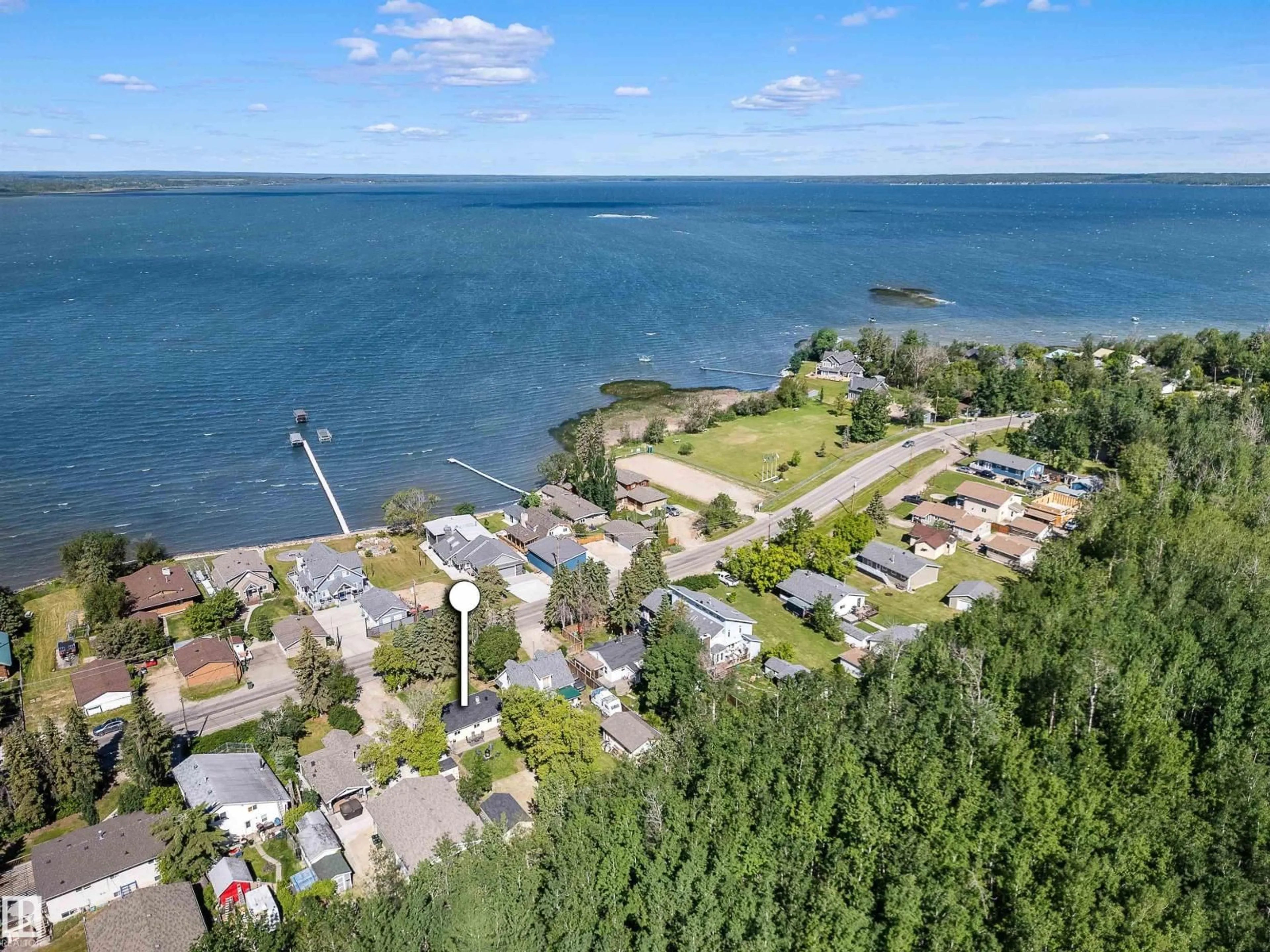A pic from outside/outdoor area/front of a property/back of a property/a pic from drone, water/lake/river/ocean view for 4515 SUNSET DR, Rural Lac Ste. Anne County Alberta T0E0A0