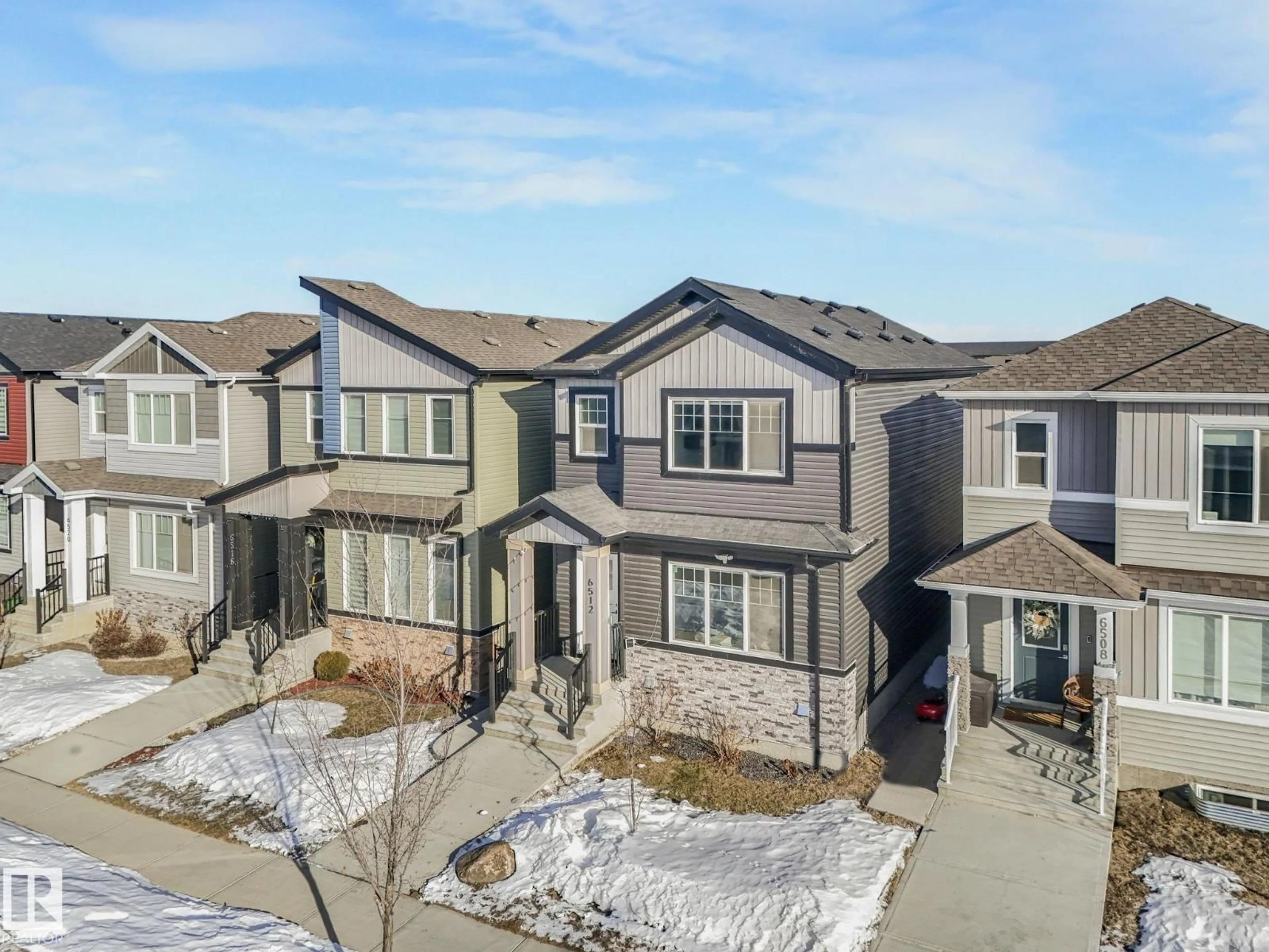 A pic from outside/outdoor area/front of a property/back of a property/a pic from drone, street for 6512 175 AV, Edmonton Alberta T5Y4B3