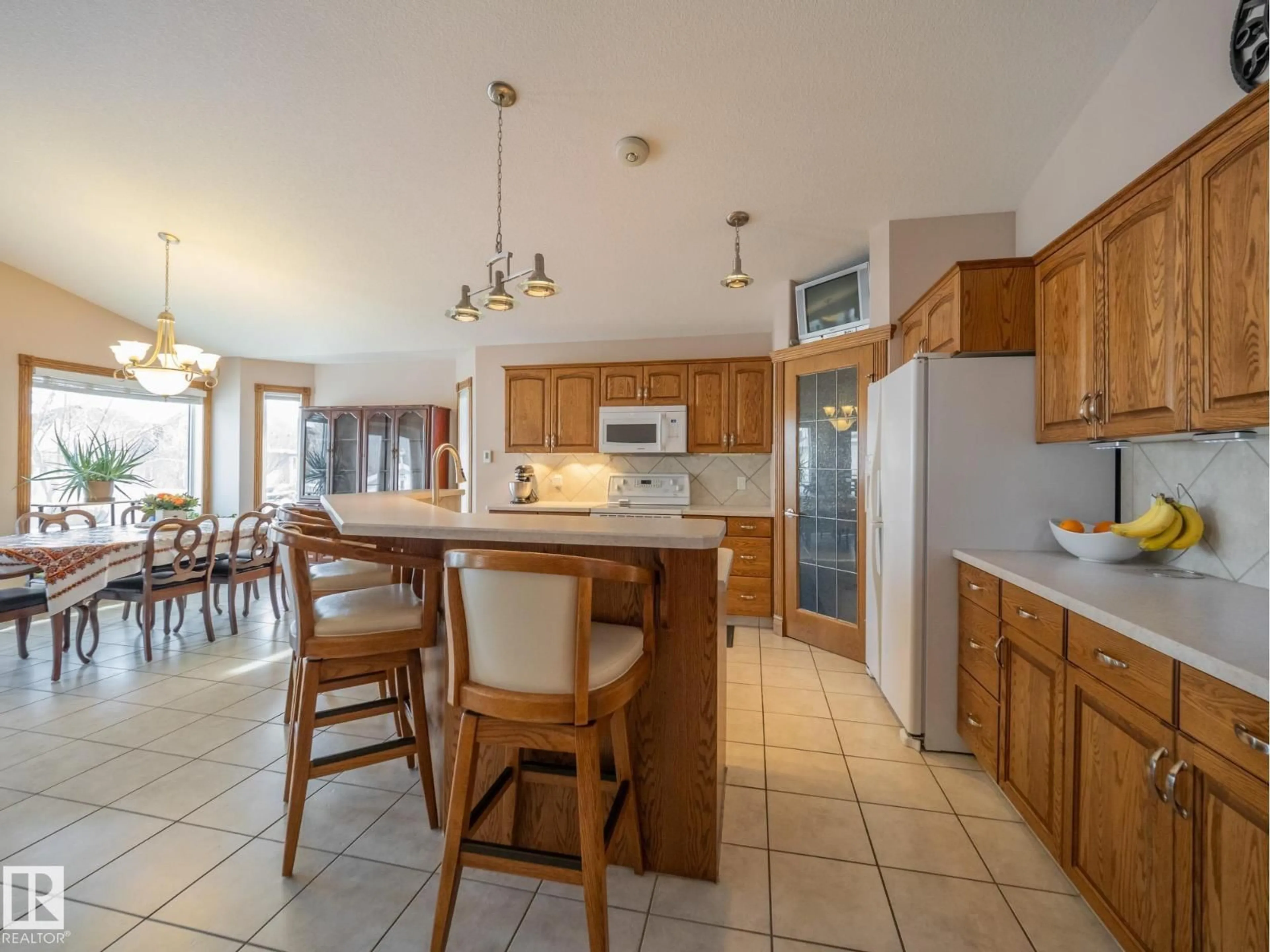 Open concept kitchen, ceramic/tile floor for 40 HAWKSTONE LD, Sherwood Park Alberta T8A6M9