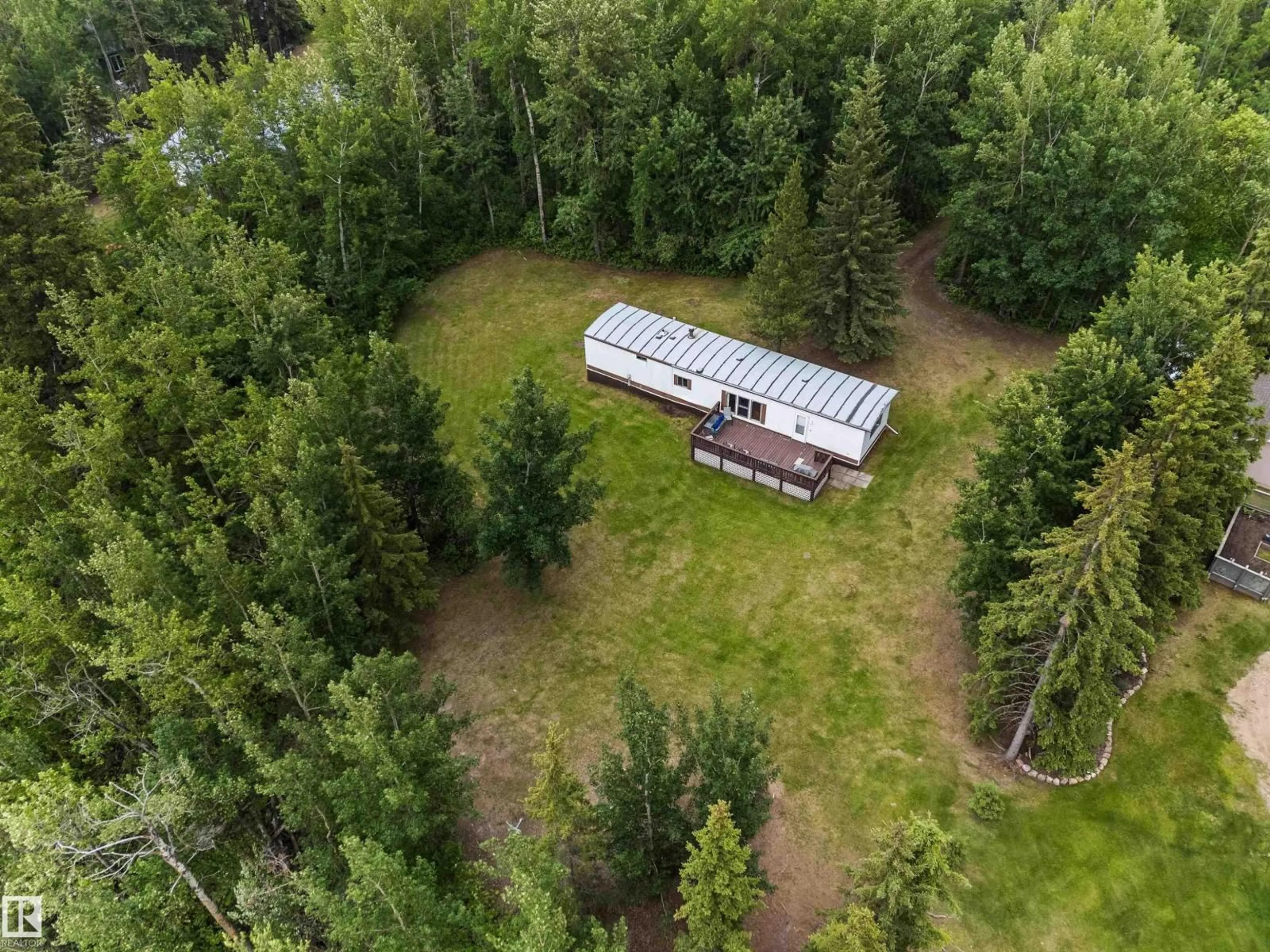 A pic from outside/outdoor area/front of a property/back of a property/a pic from drone, forest/trees view for 16 TWP ROAD 565 TWP, Rural Lac Ste. Anne County Alberta T0E1V0