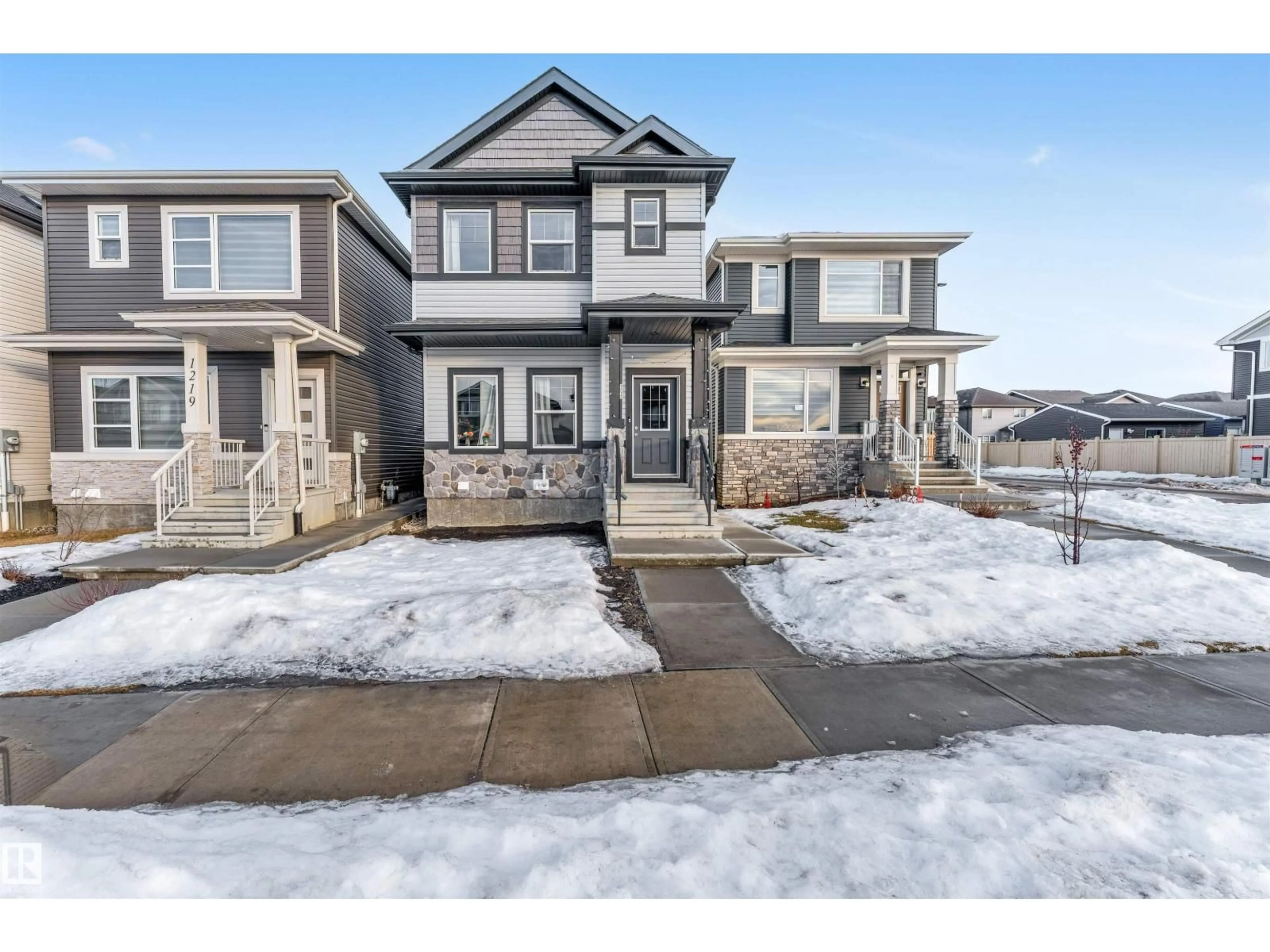 Home with vinyl exterior material, street for 1217 WATT DR, Edmonton Alberta T6X2P1