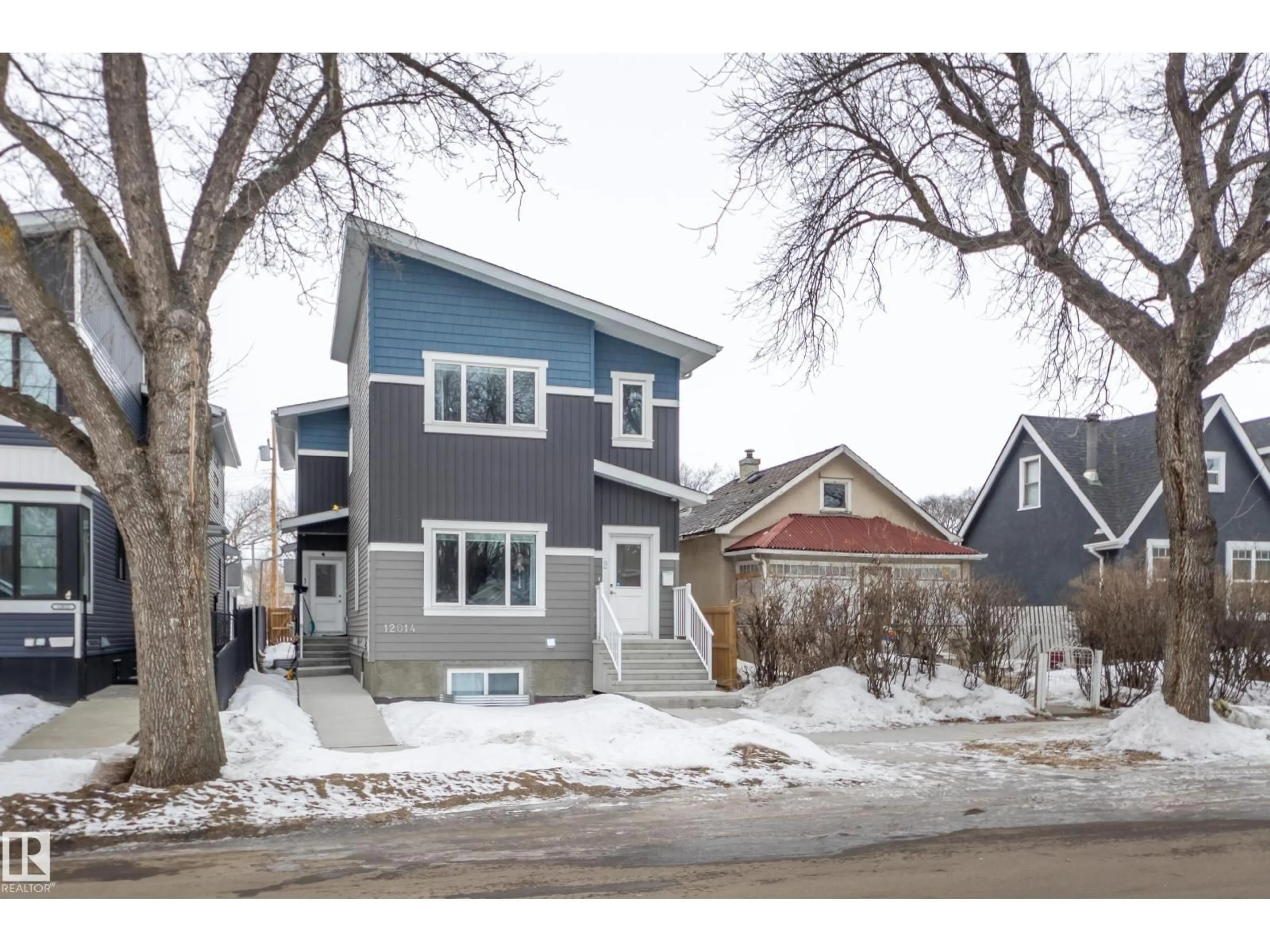 Home with vinyl exterior material, street for #2 - 12014 92 ST, Edmonton Alberta T5G1A9