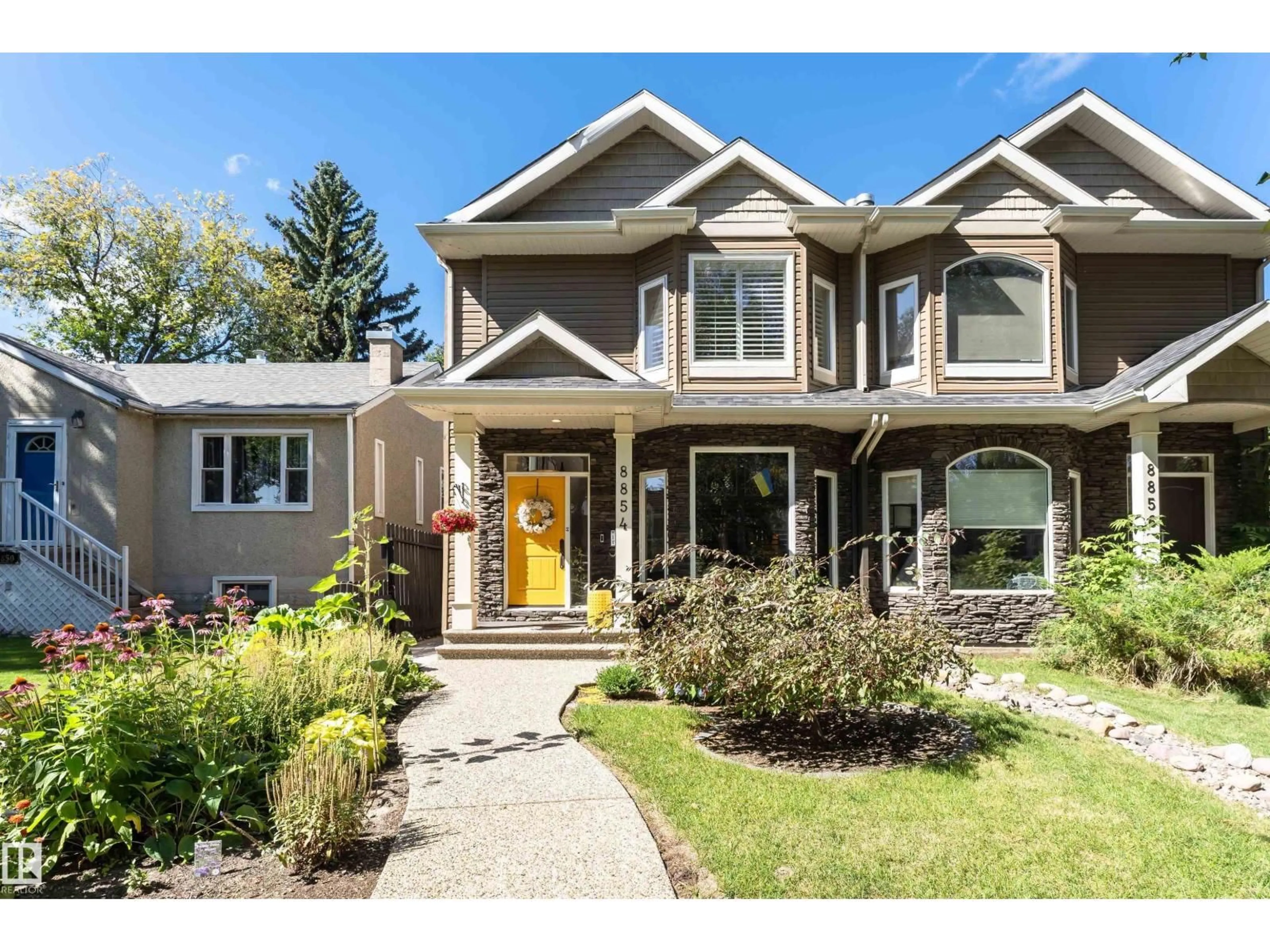 Home with vinyl exterior material, street for 8854 89 ST, Edmonton Alberta T6C3K6