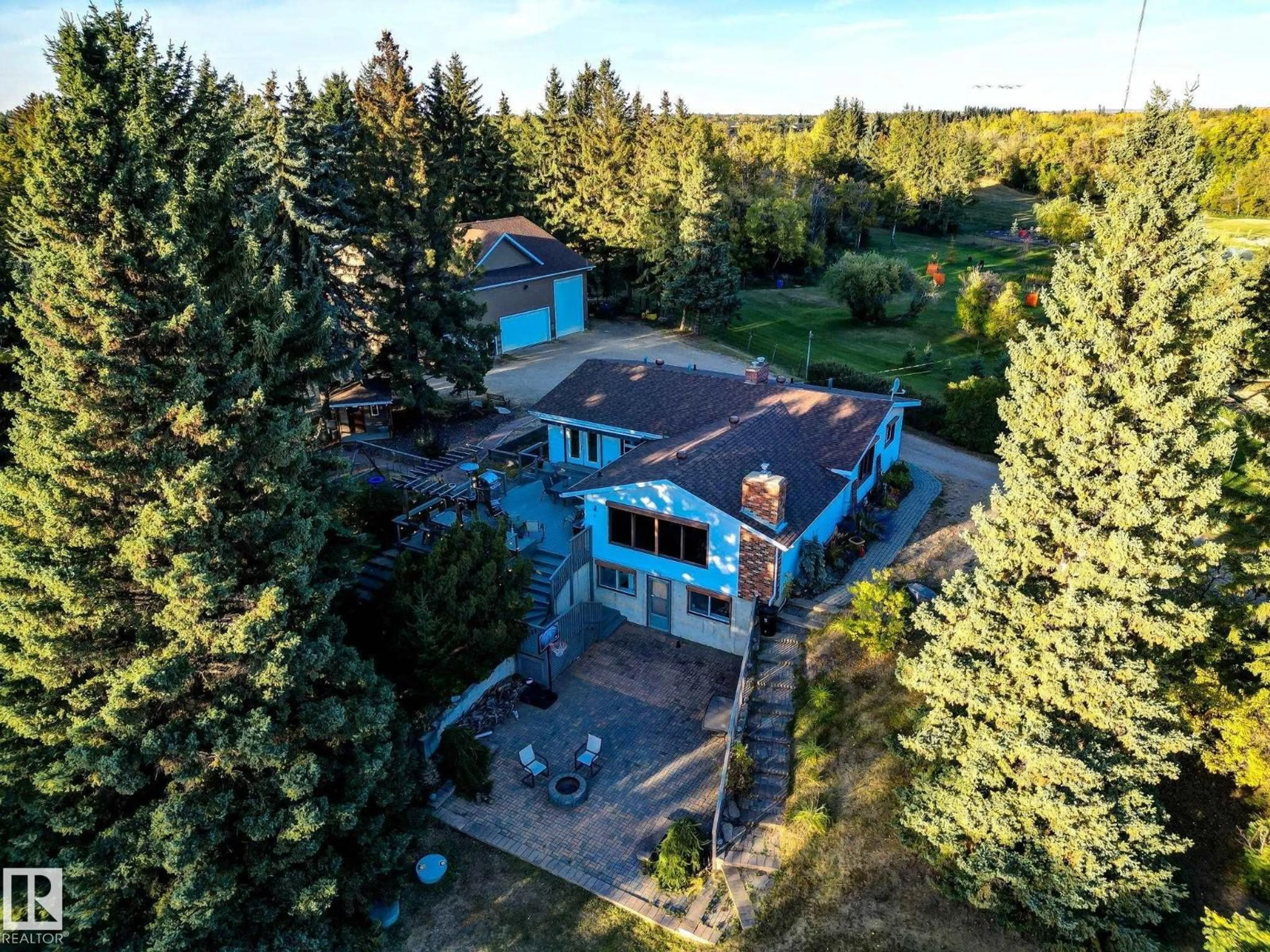 A pic from outside/outdoor area/front of a property/back of a property/a pic from drone, unknown for 193 - 52310 RGE ROAD 232, Rural Strathcona County Alberta T8B1C2