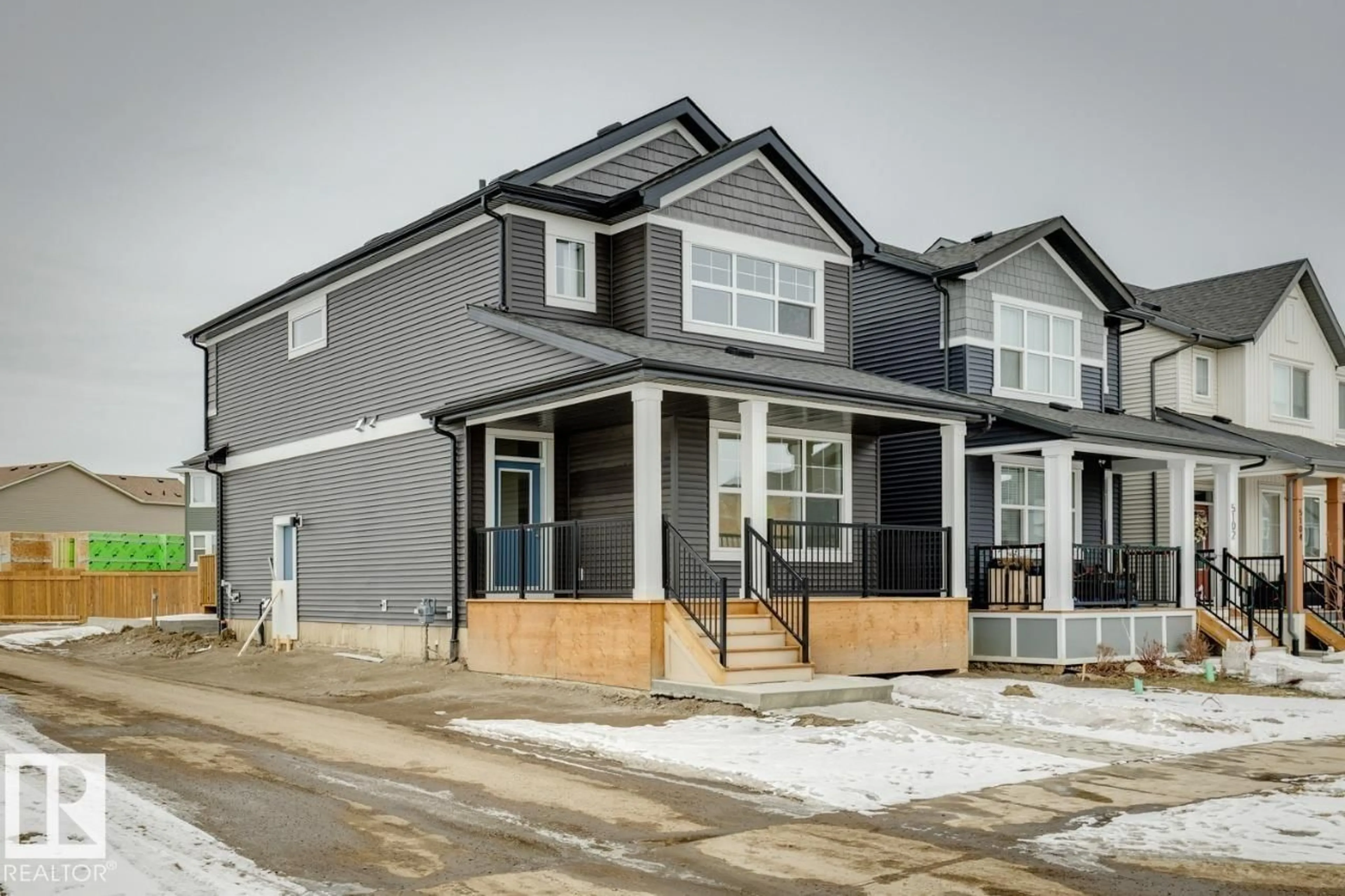 Home with vinyl exterior material, street for 5100 PARC RUNIS WY, Beaumont Alberta T4X3E4