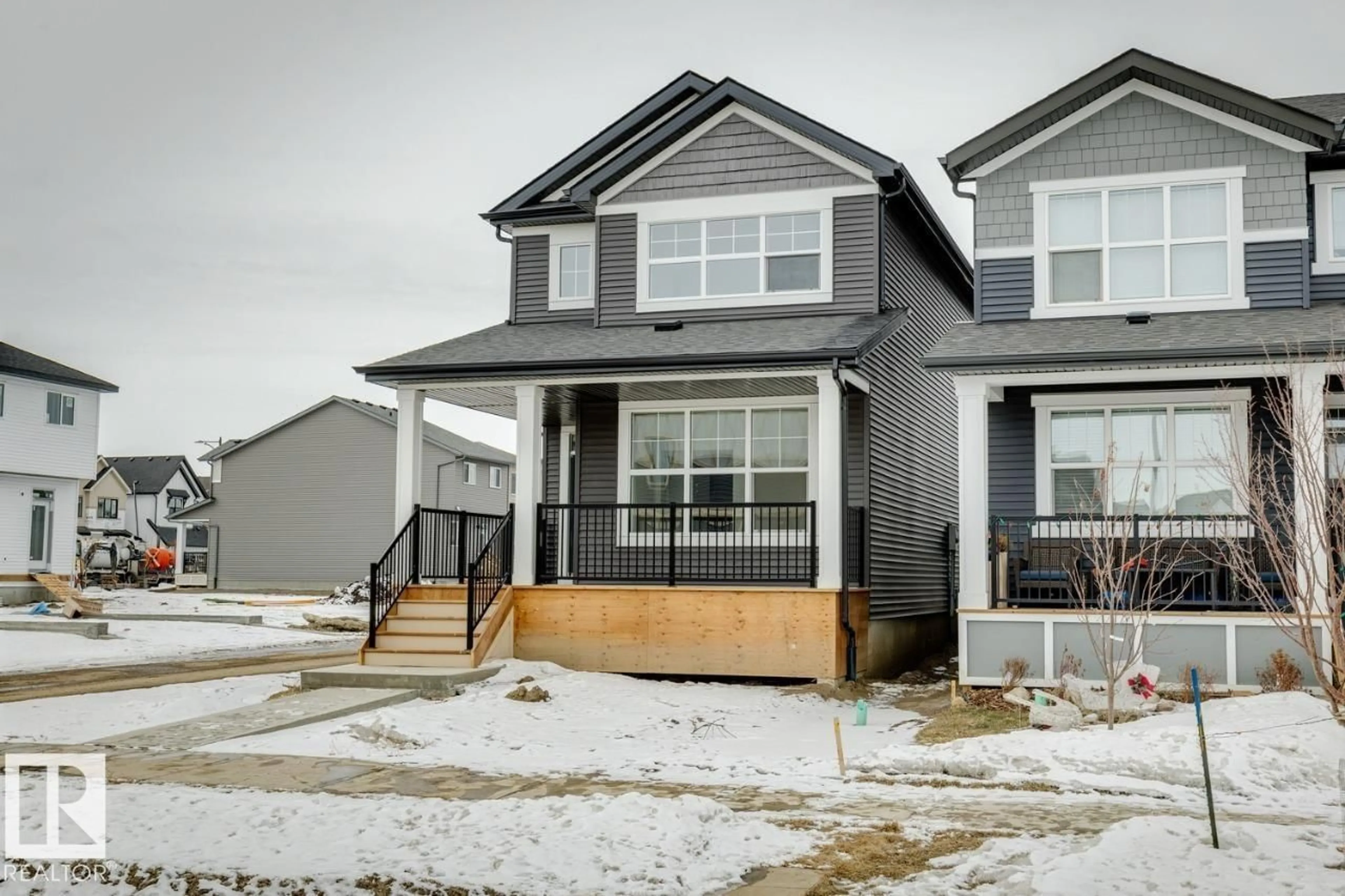 Home with vinyl exterior material, street for 5100 PARC RUNIS WY, Beaumont Alberta T4X3E4