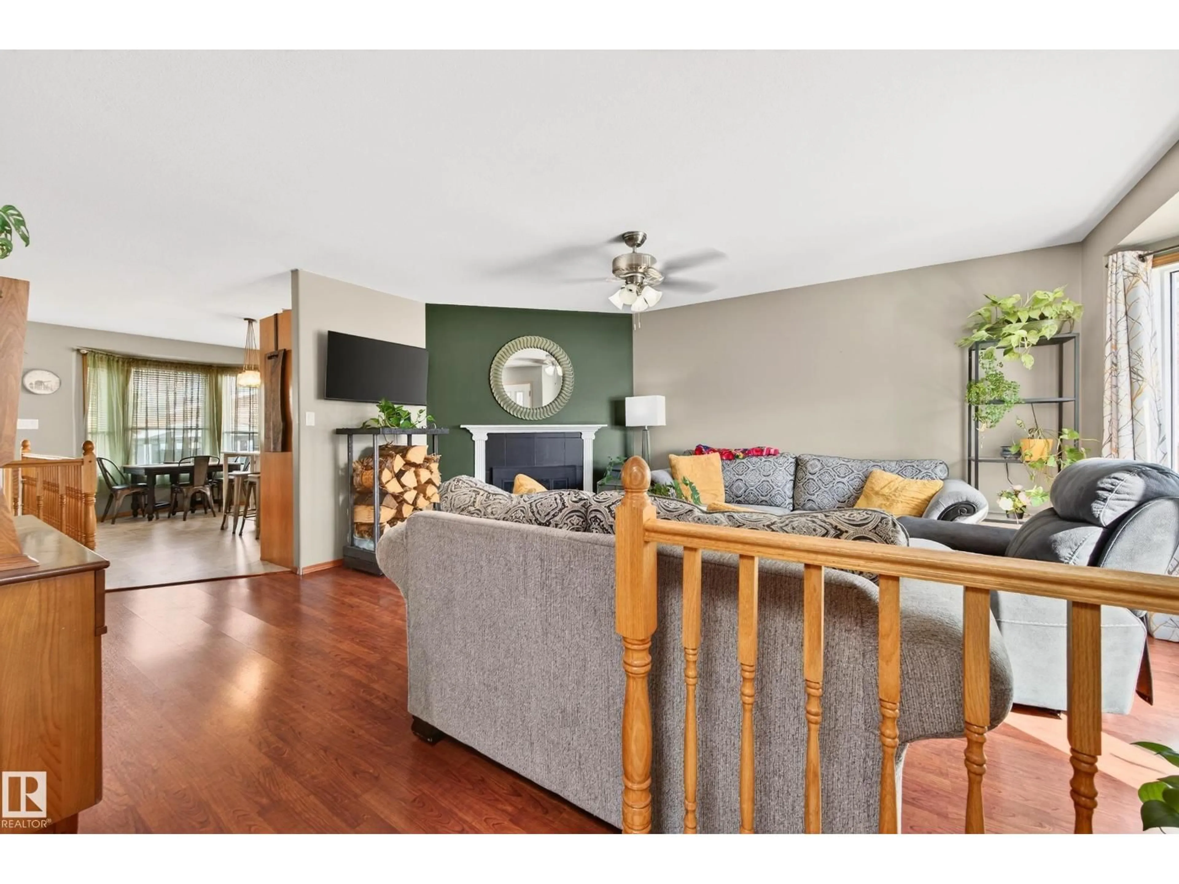 Living room with furniture, wood/laminate floor for 4622 53 AV, Bruderheim Alberta T0B0S0