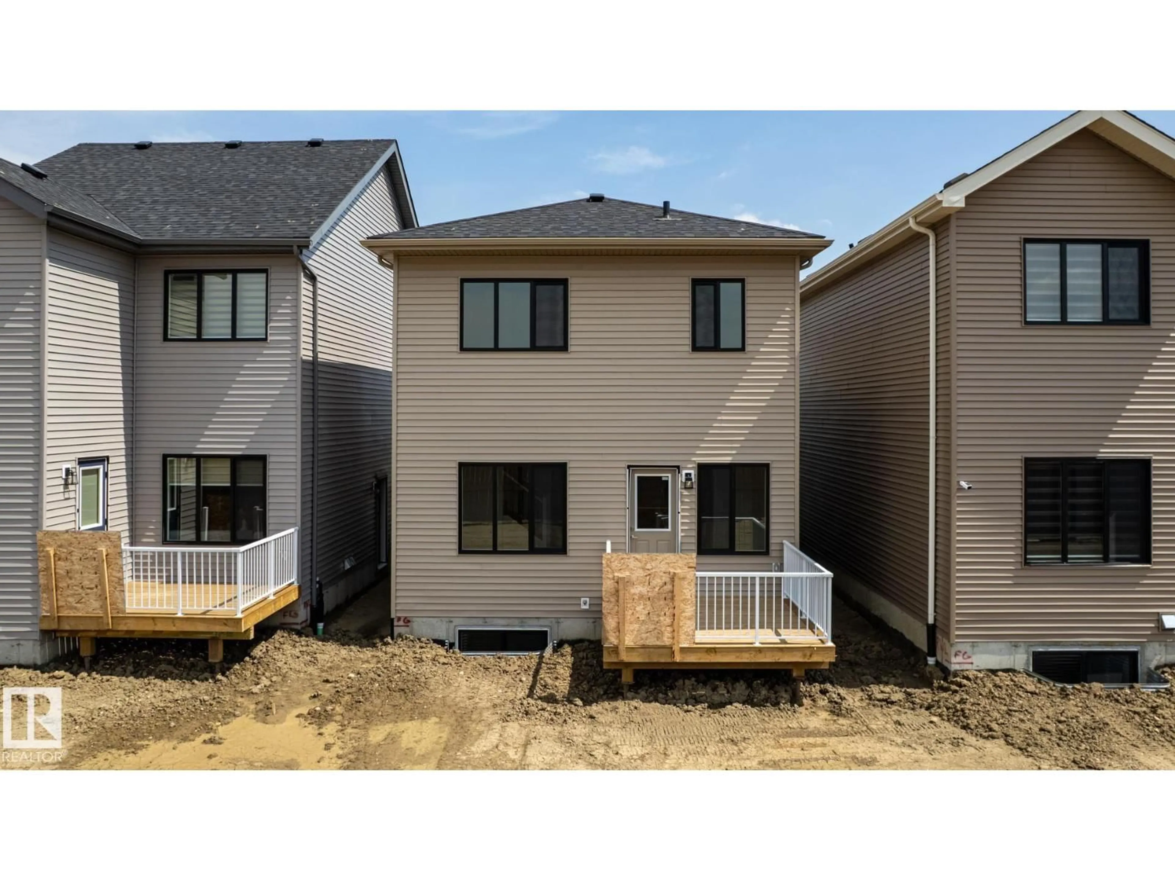 Home with vinyl exterior material, street for NW - 3036 197 ST, Edmonton Alberta T6M3L9