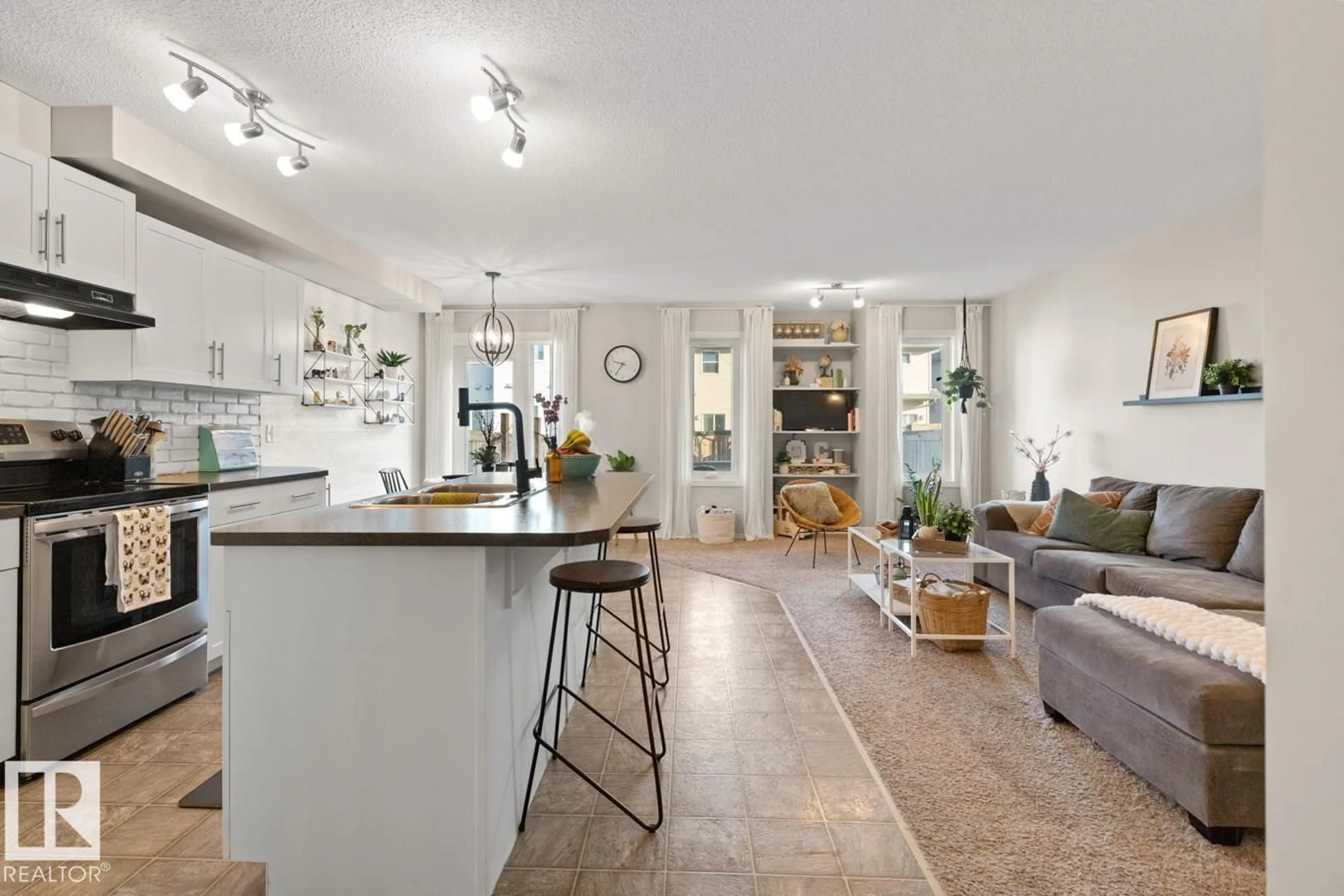 Open concept kitchen, unknown for 3124 16 AV, Edmonton Alberta T6T0T8