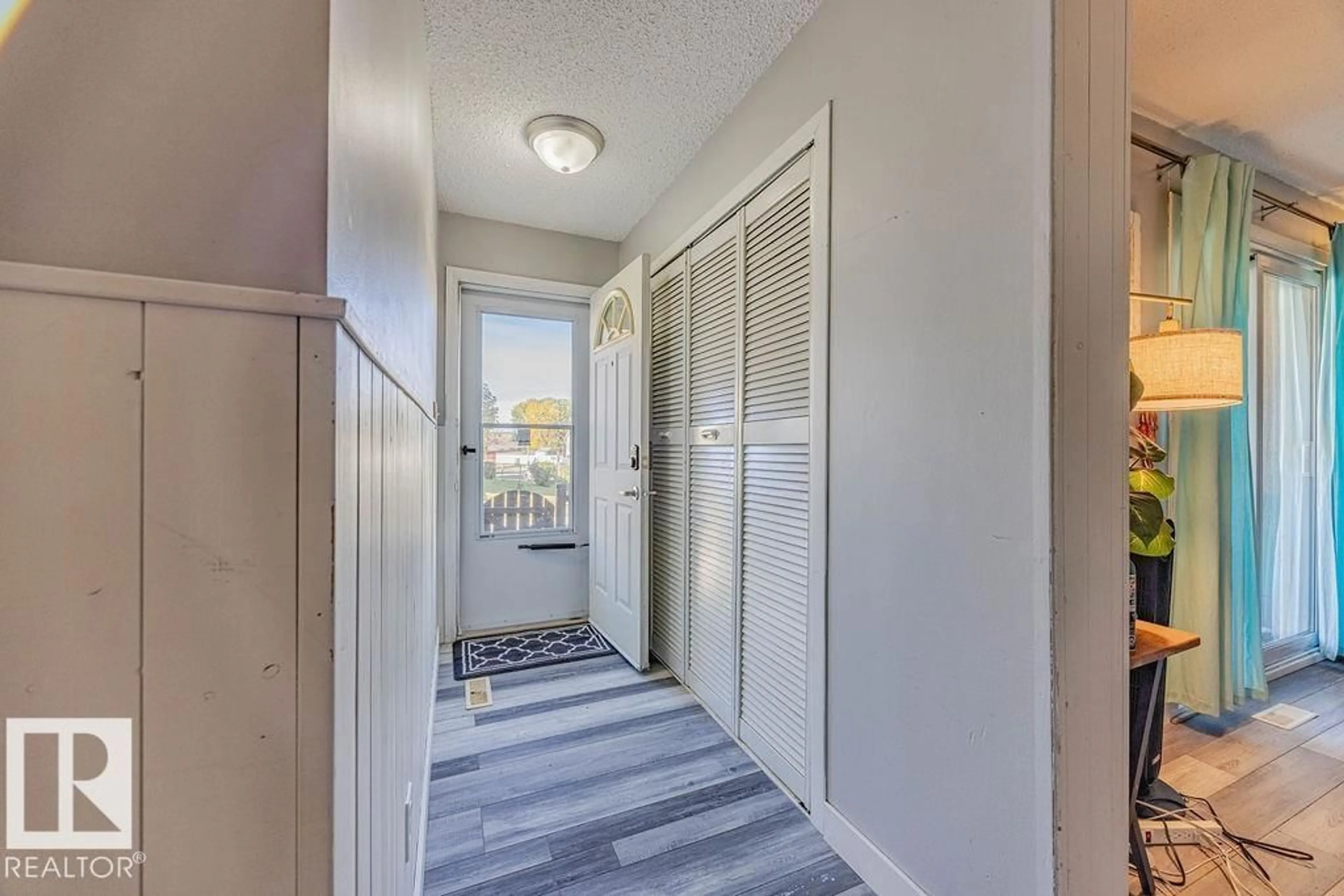 Indoor entryway for 8005 27 AV, Edmonton Alberta T6K3C9