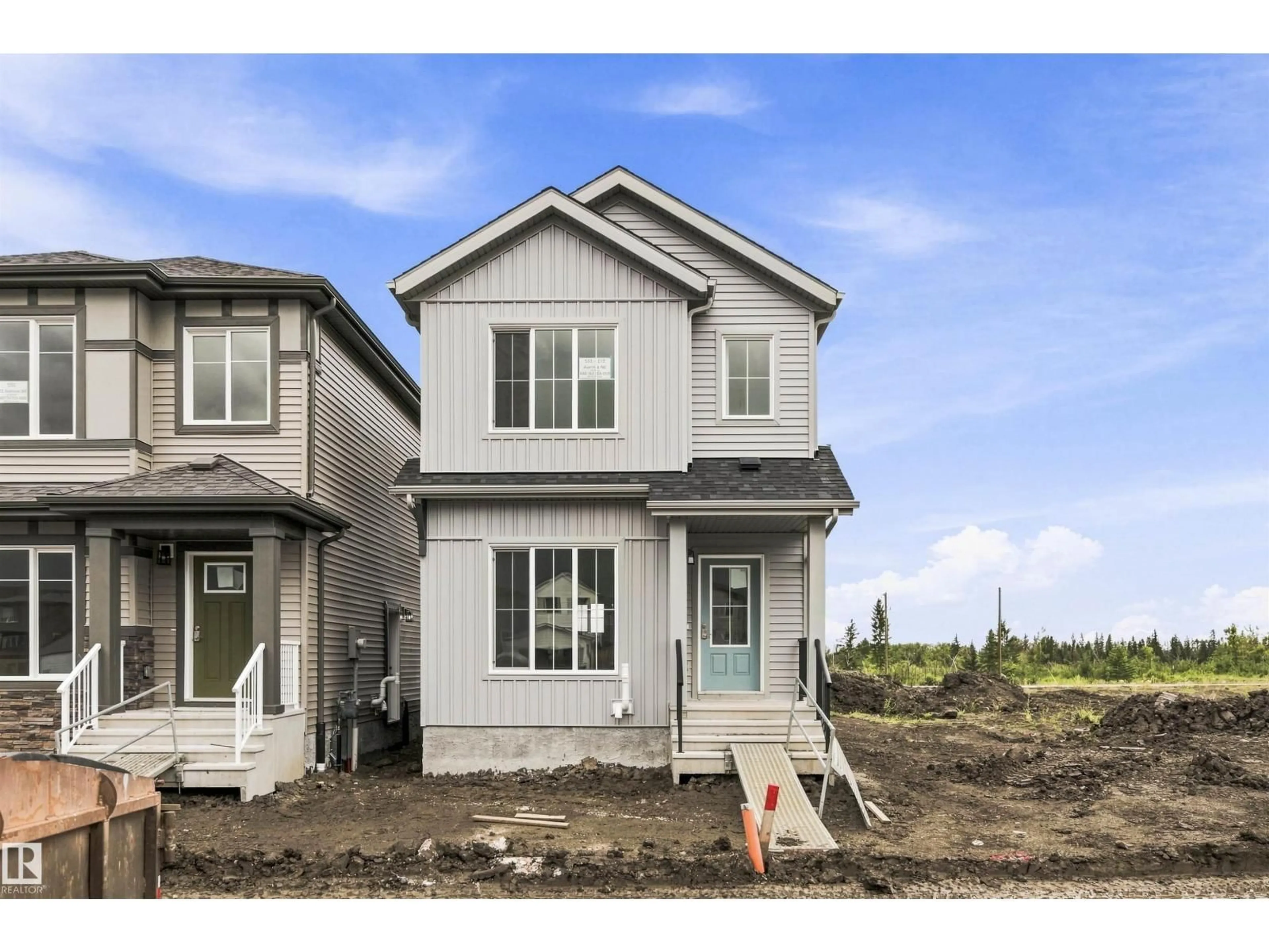 Home with vinyl exterior material, street for 551 172 AV, Edmonton Alberta T5Y6M6