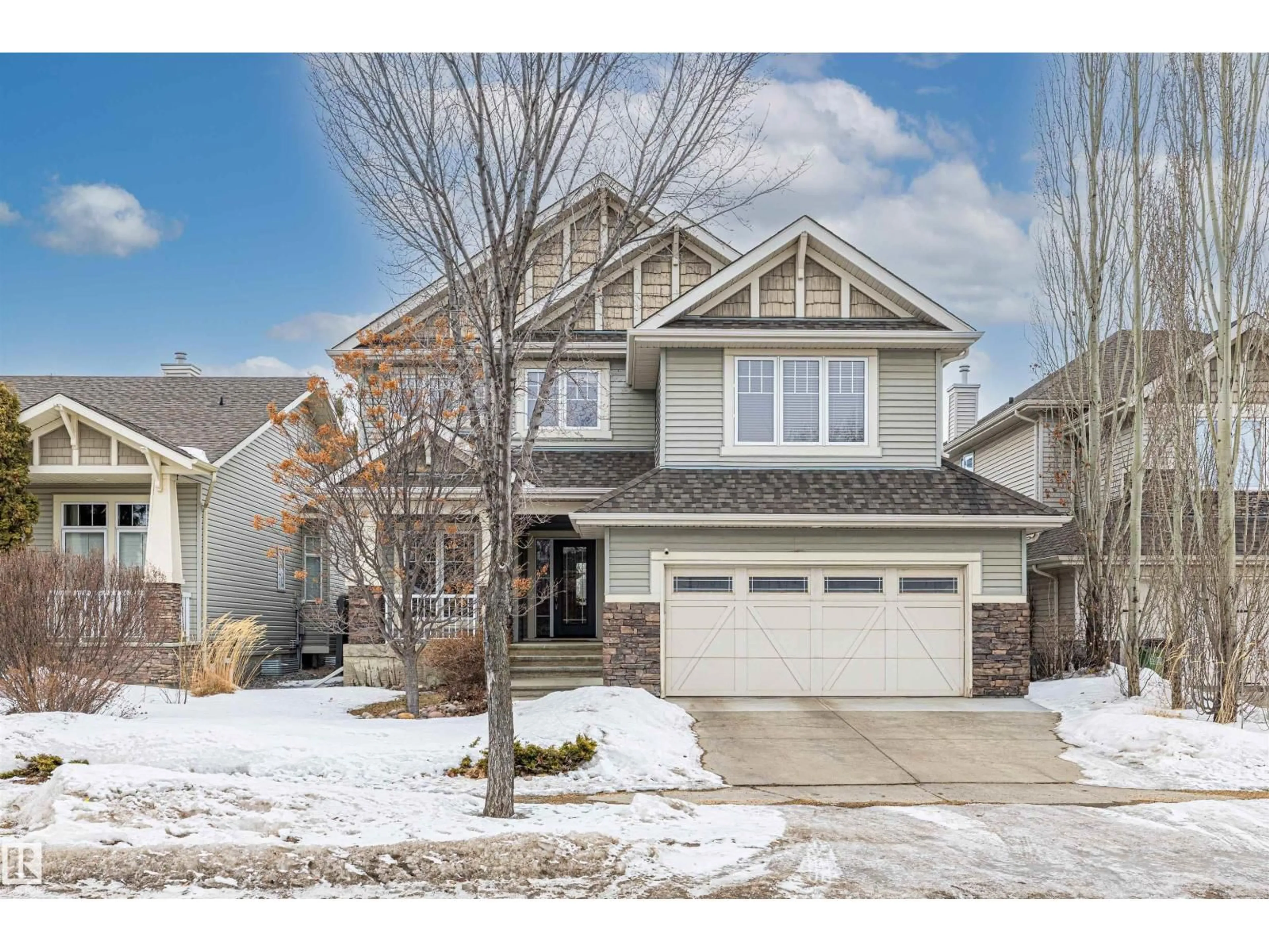 Home with vinyl exterior material, street for 1014 HOPE RD, Edmonton Alberta T6M3A1