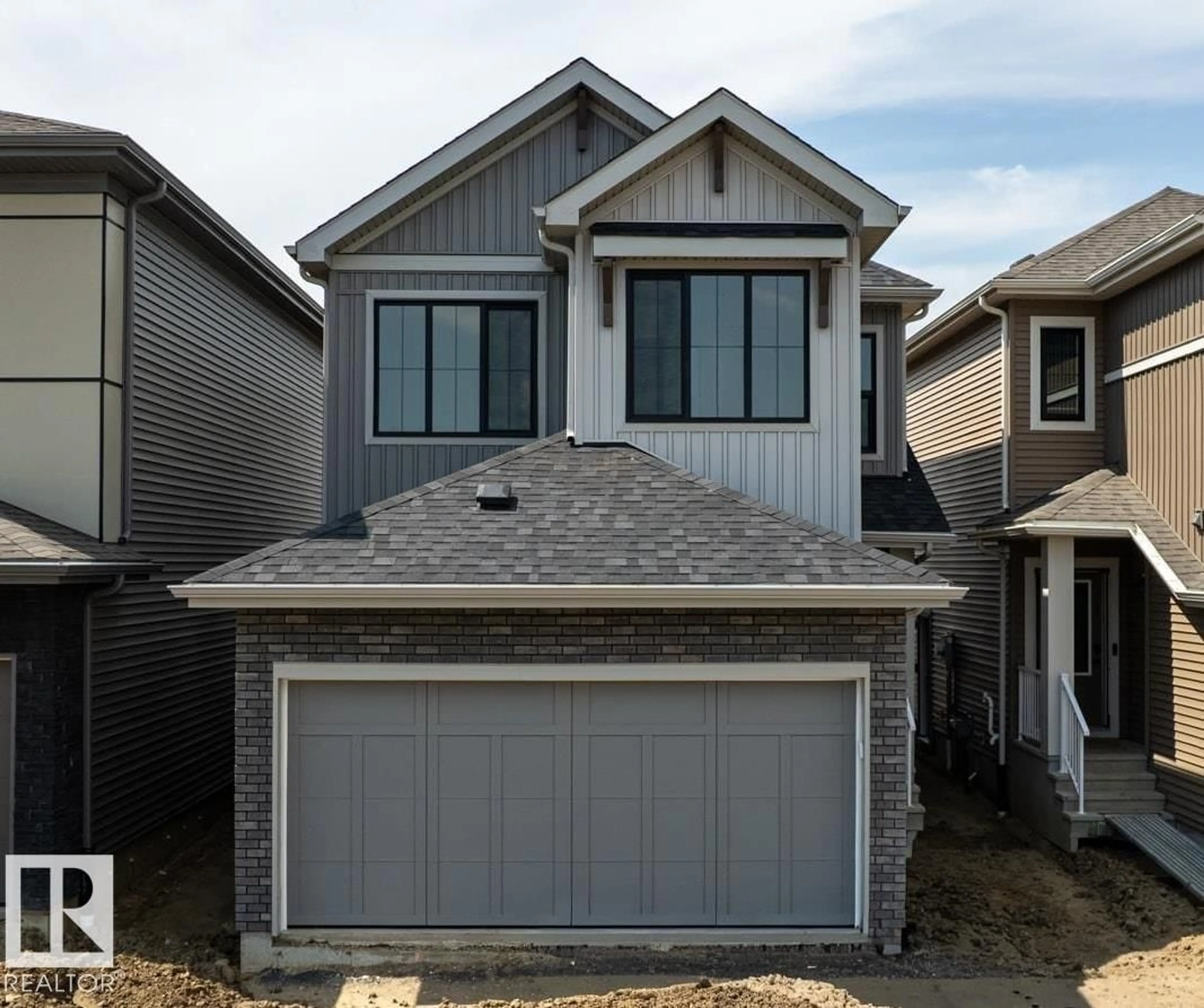 Home with vinyl exterior material, street for NW - 3028 197 ST, Edmonton Alberta T6M3L9