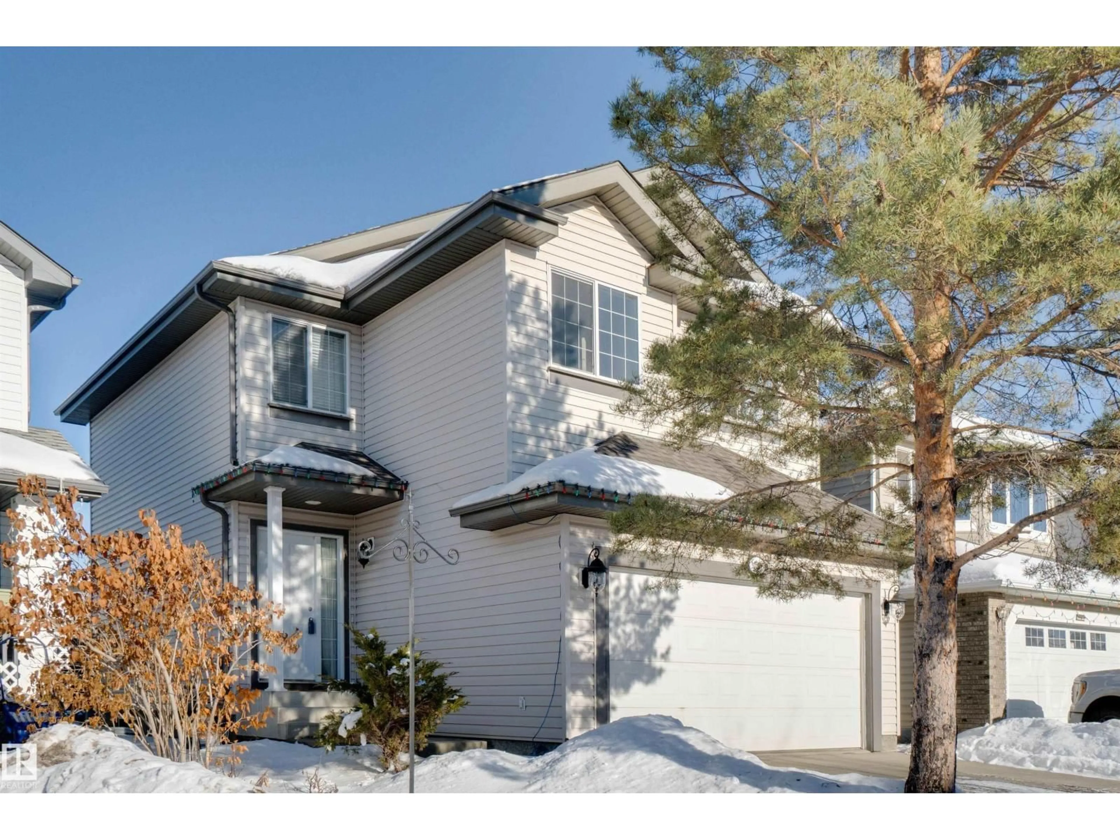 Home with vinyl exterior material, street for 21208 89A AV, Edmonton Alberta T5T6V5