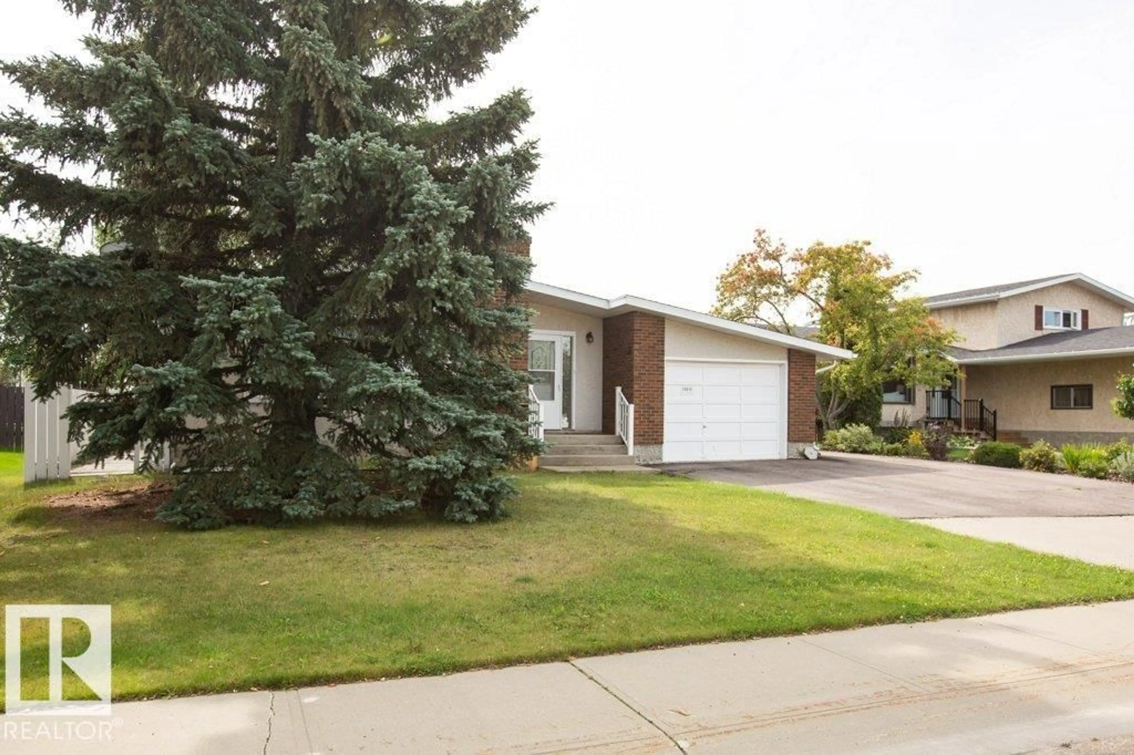 Home with vinyl exterior material, street for 10615 108 ST, Westlock Alberta T7P1E1