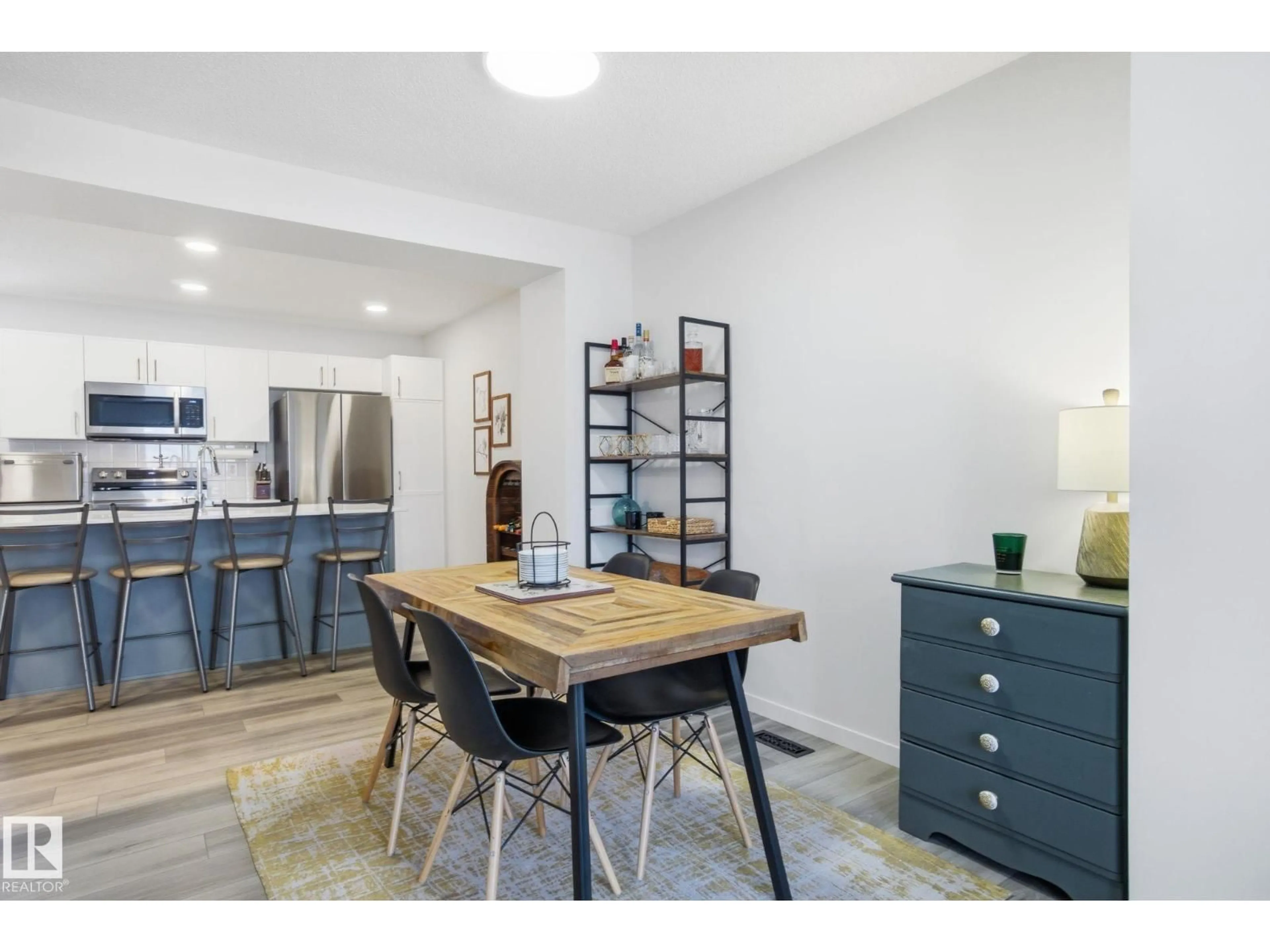 Open concept kitchen, wood/laminate floor for NW - 2826 192 ST, Edmonton Alberta T6X3B5