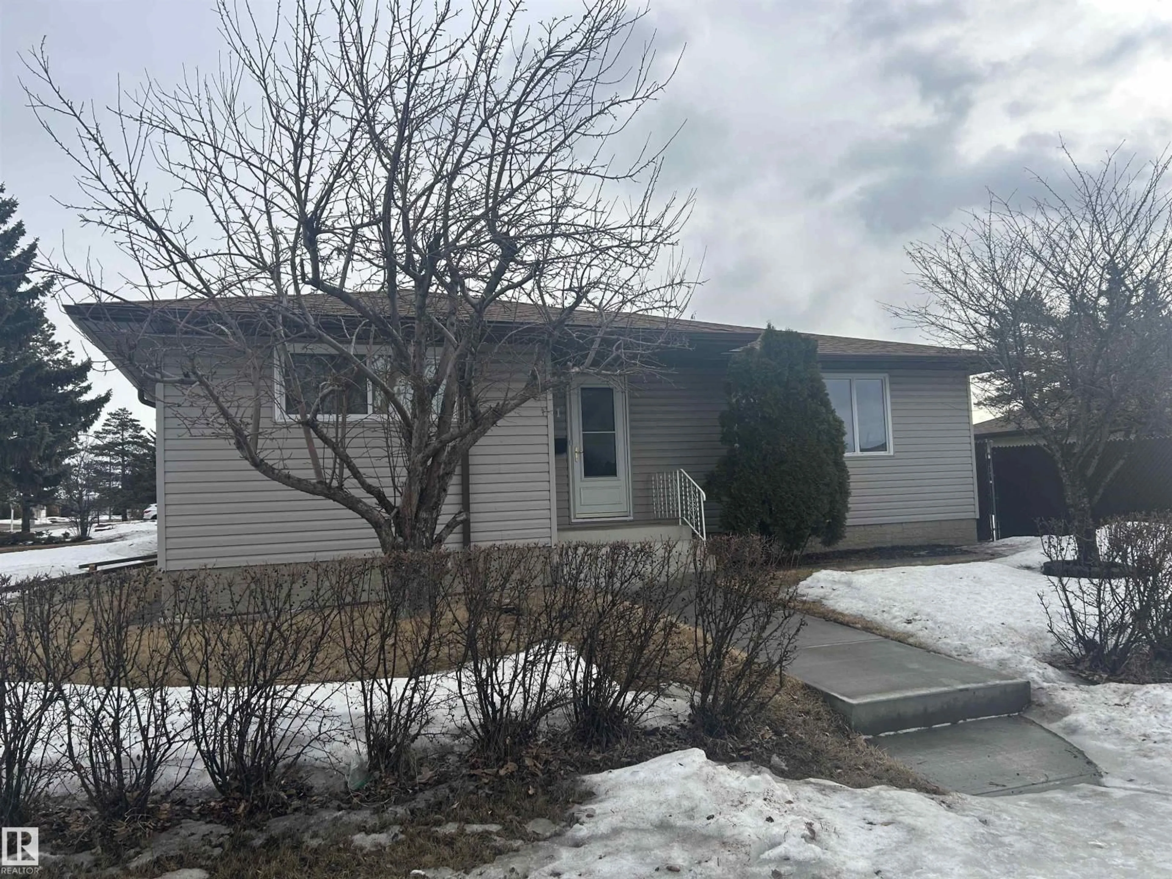 Home with vinyl exterior material, street for NW - 14911 77 ST, Edmonton Alberta T5C1E9