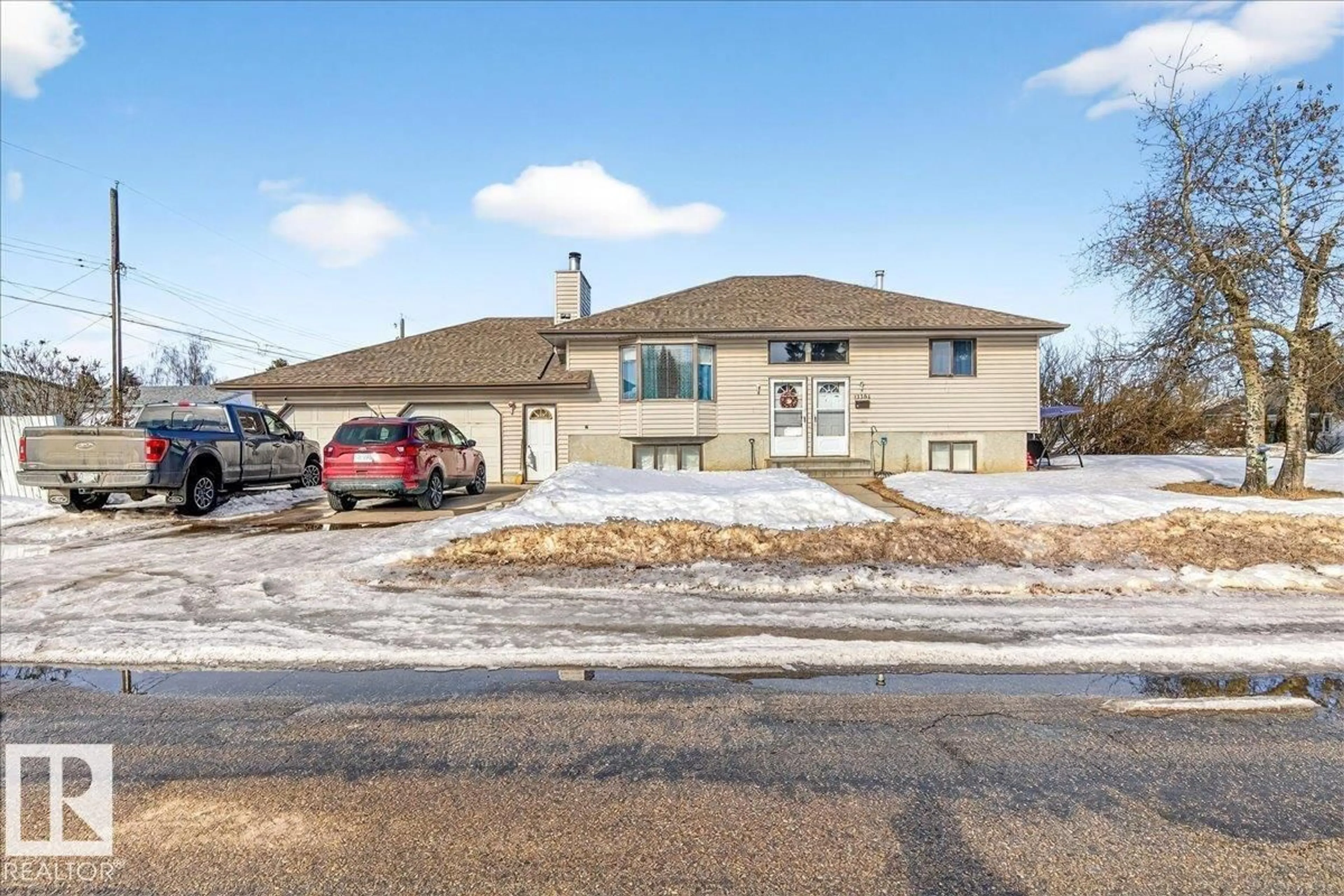 A pic from outside/outdoor area/front of a property/back of a property/a pic from drone, street for 13304 130 AV, Edmonton Alberta T5L3L9
