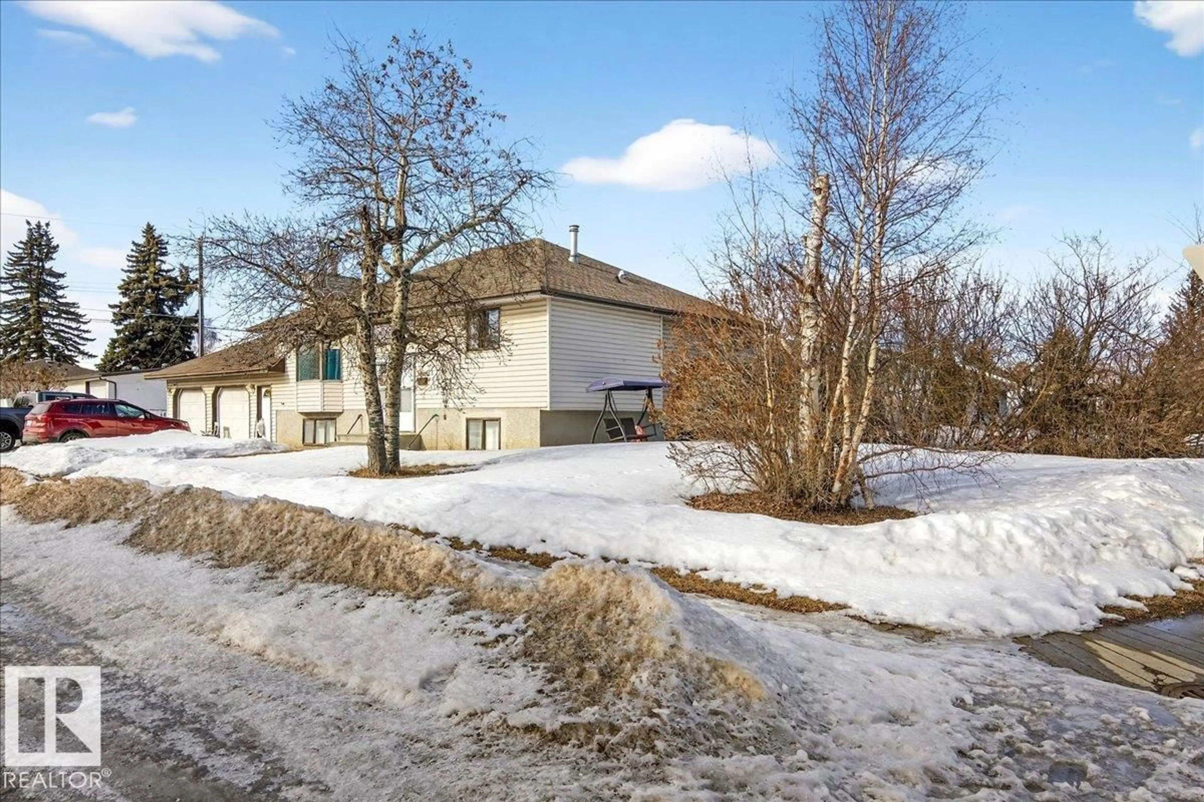 A pic from outside/outdoor area/front of a property/back of a property/a pic from drone, street for 13304 130 AV, Edmonton Alberta T5L3L9