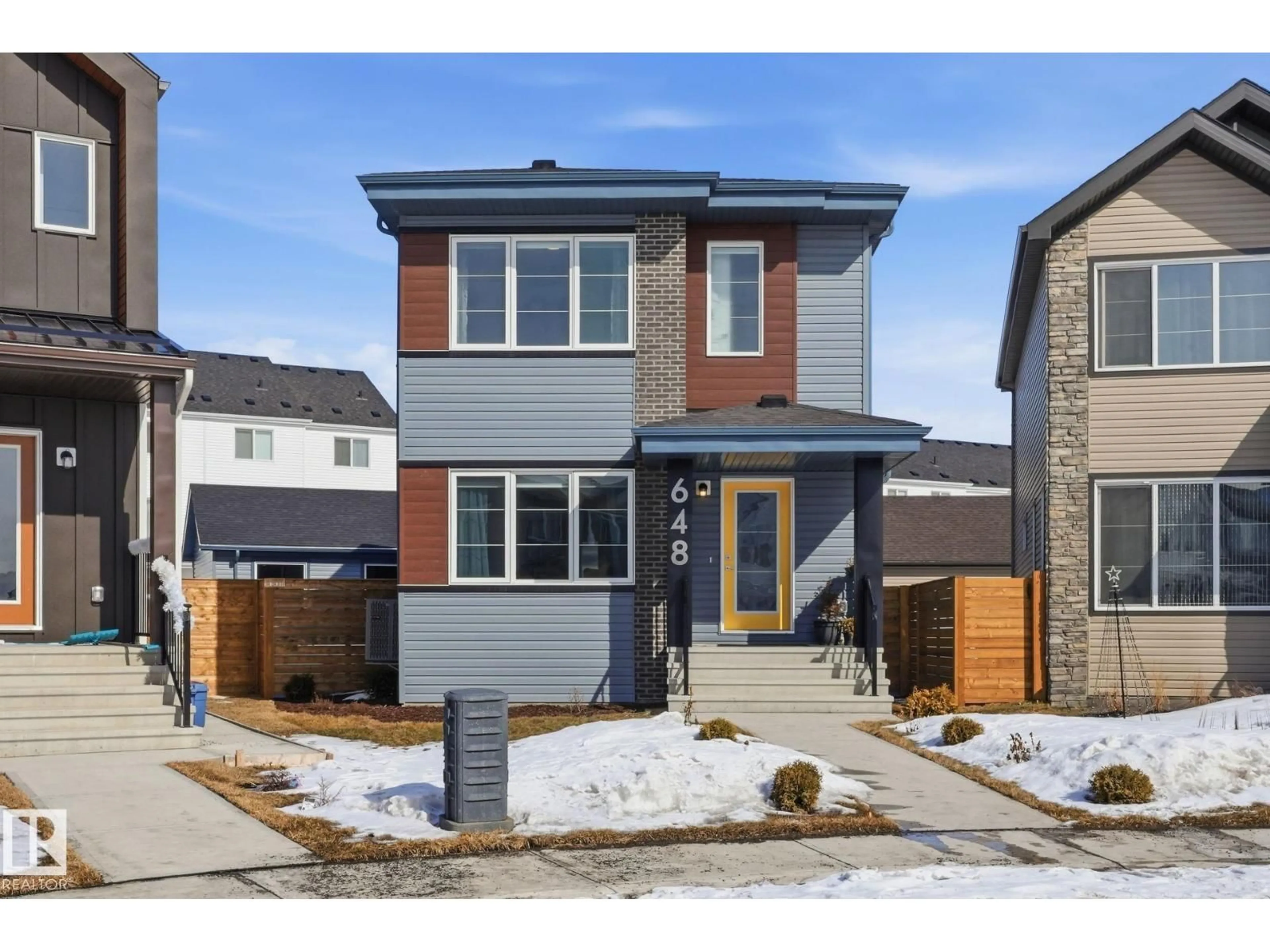 Home with brick exterior material, street for NE - 648 174 AV, Edmonton Alberta T5Y4E9