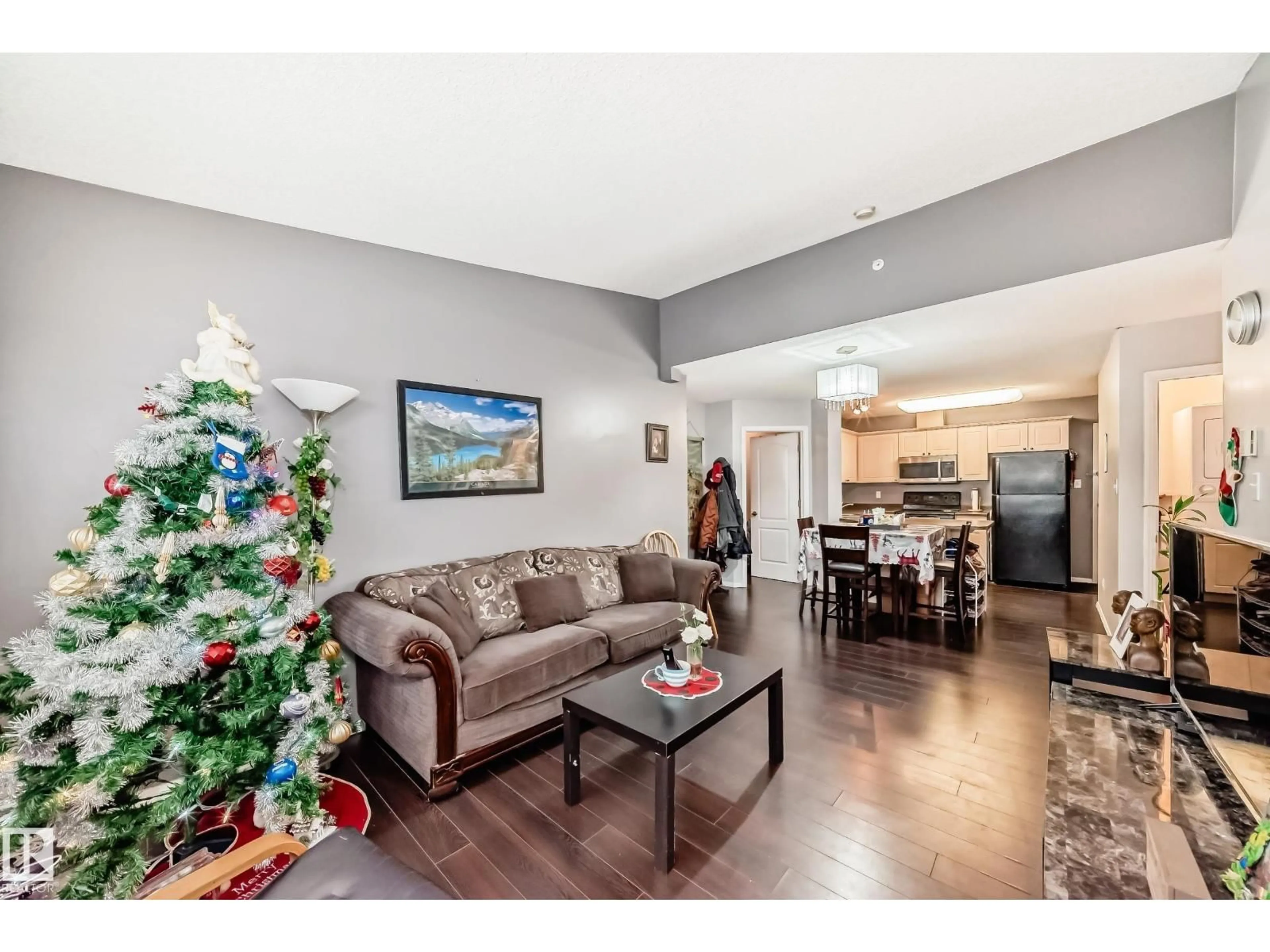 Living room with furniture, wood/laminate floor for #422 - 12838 65 ST NW, Edmonton Alberta T5A5H3