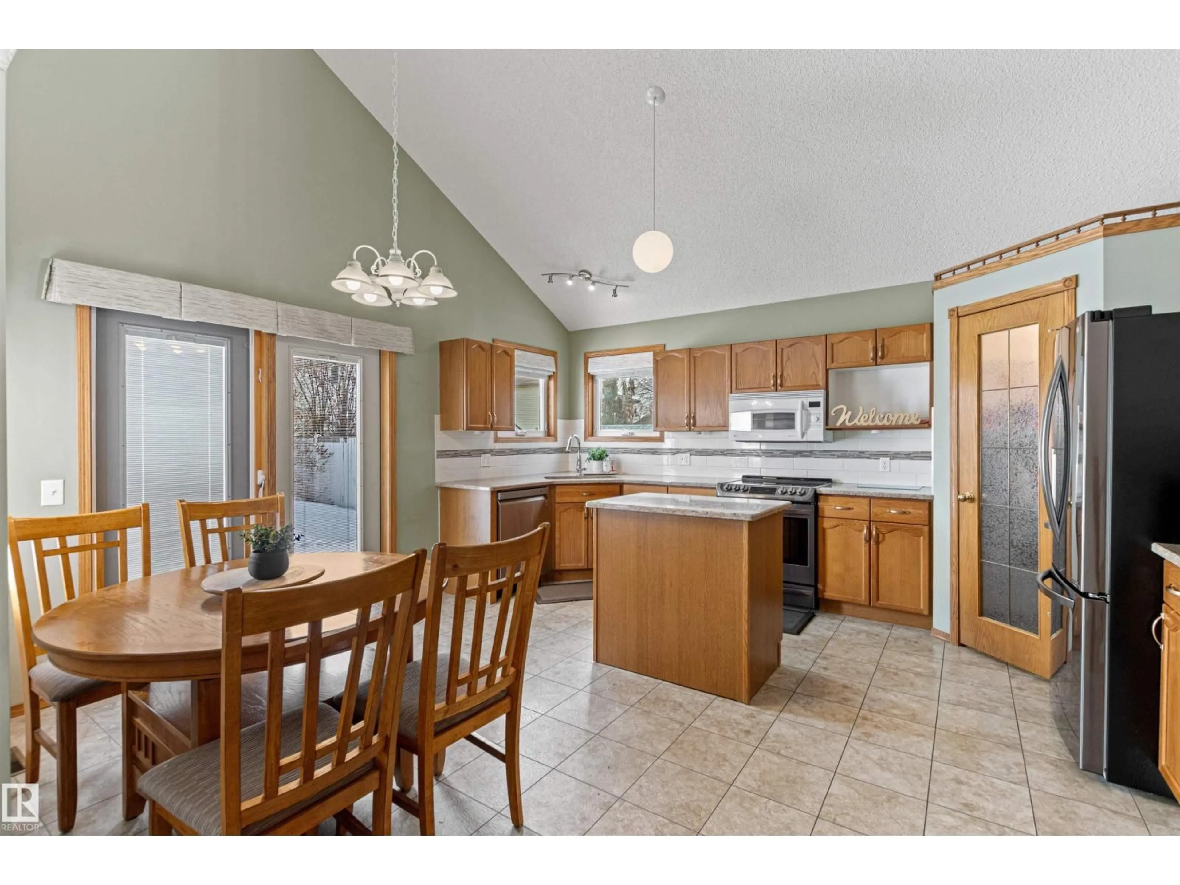 Open concept kitchen, unknown for NW - 15815 63 ST, Edmonton Alberta T5Y2R8