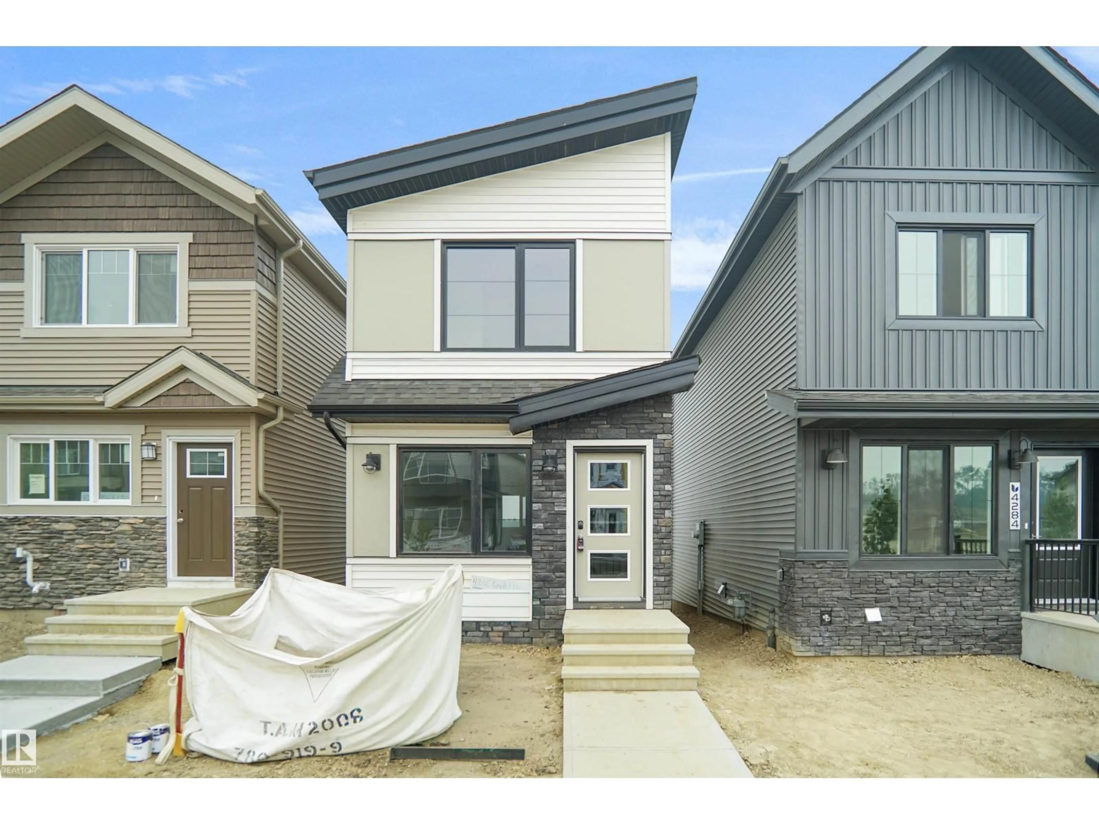 Home with vinyl exterior material, street for 4296 KINGLET DR, Edmonton Alberta T5S0T1