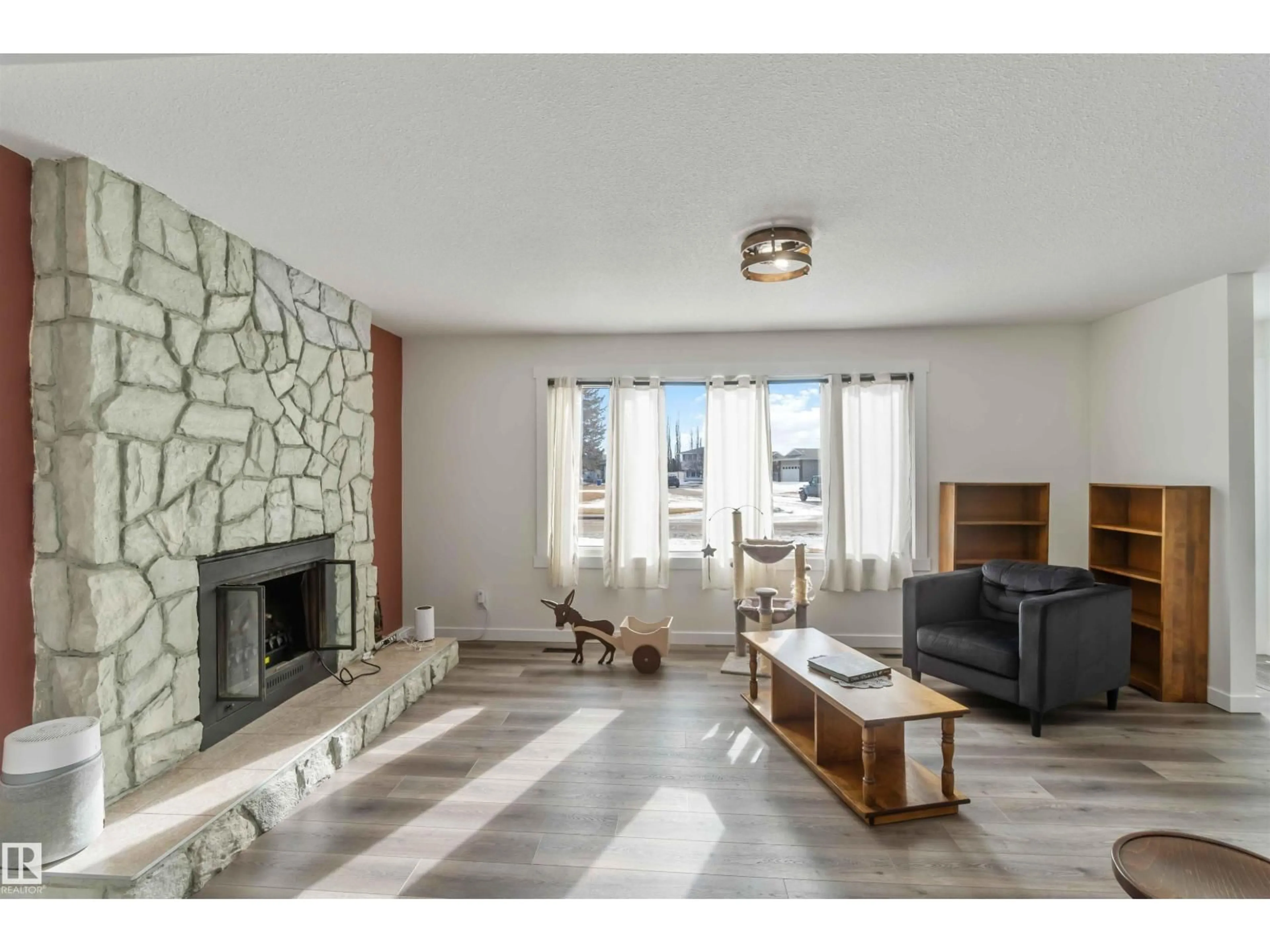 Living room with furniture, unknown for 104 OAK DR, Wetaskiwin Alberta T9A2E7