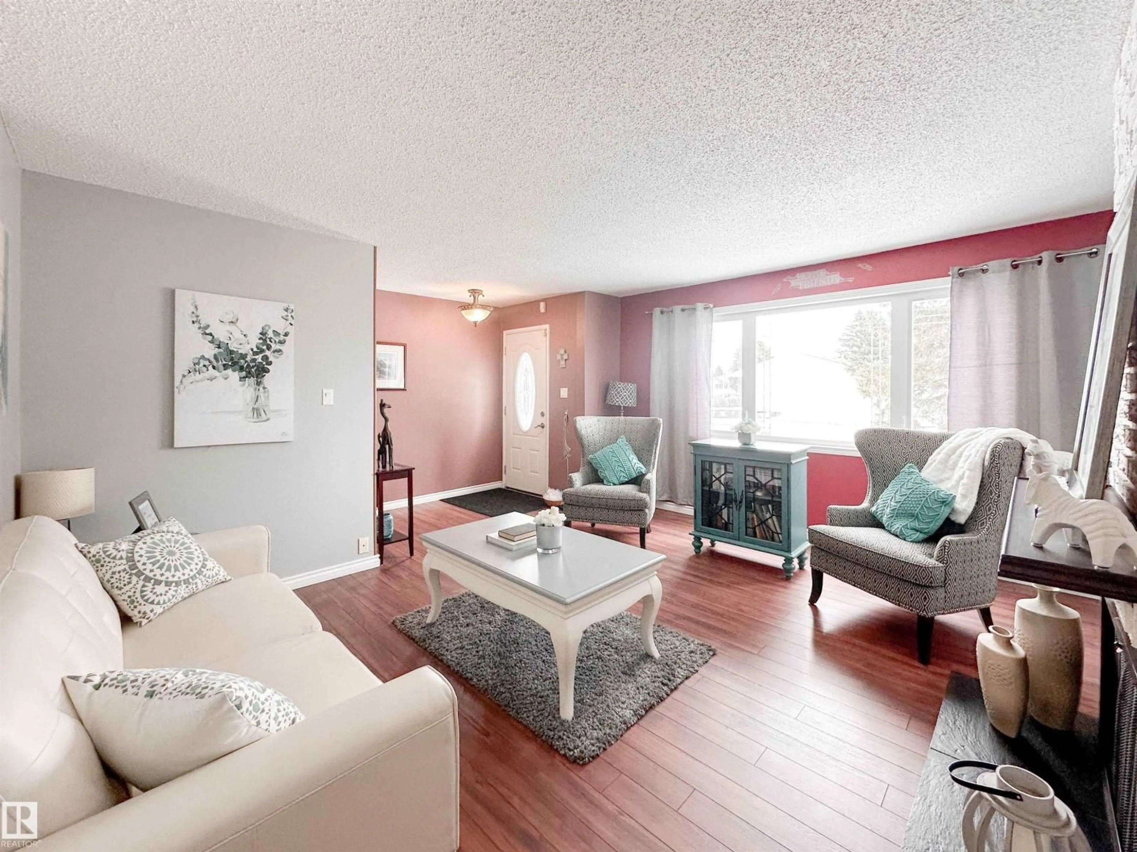 Living room with furniture, wood/laminate floor for 20 BRISTOW CR, Spruce Grove Alberta T7X2C9