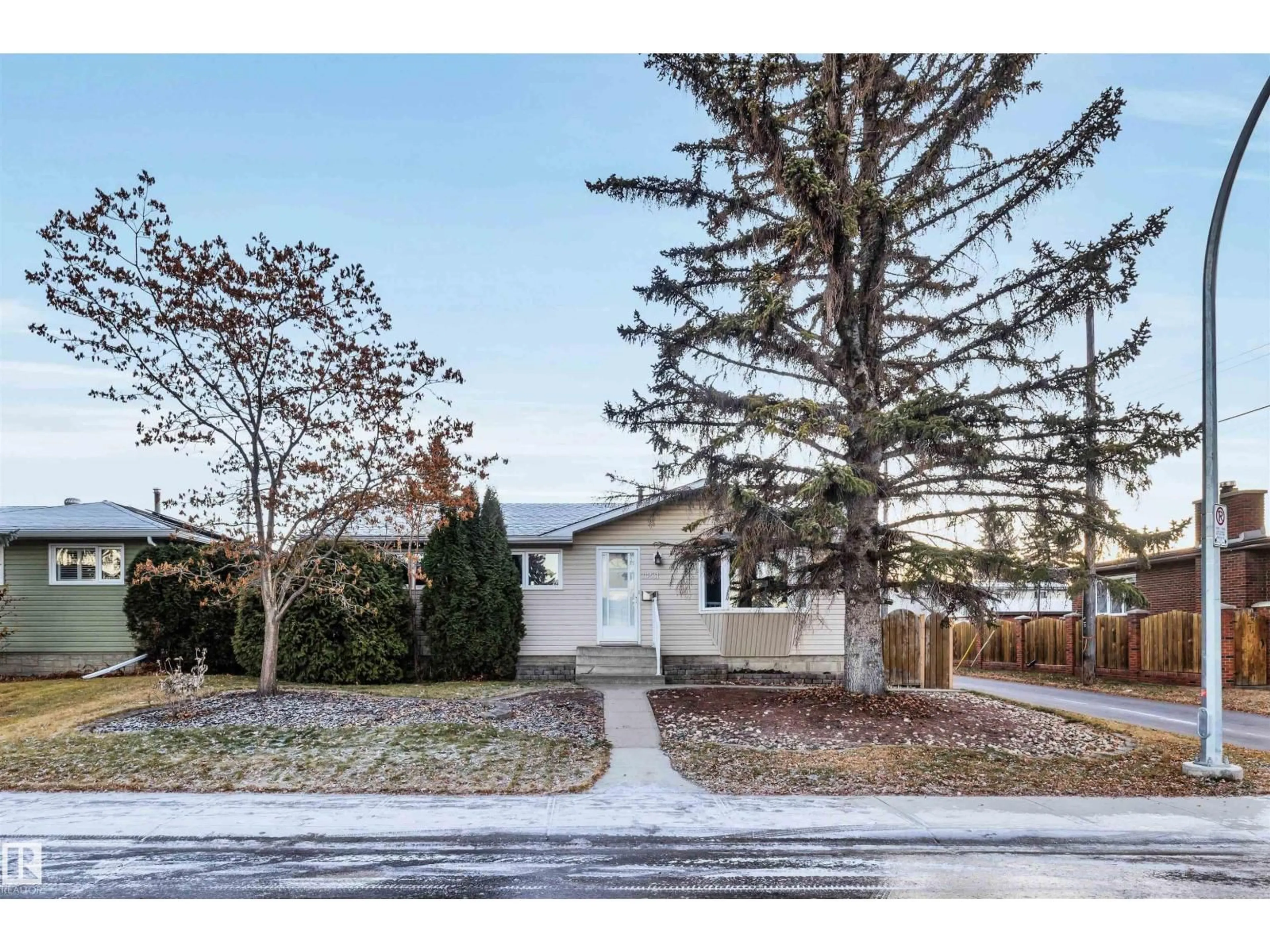 Home with vinyl exterior material, street for NW - 11231 41 AV, Edmonton Alberta T6J0T6