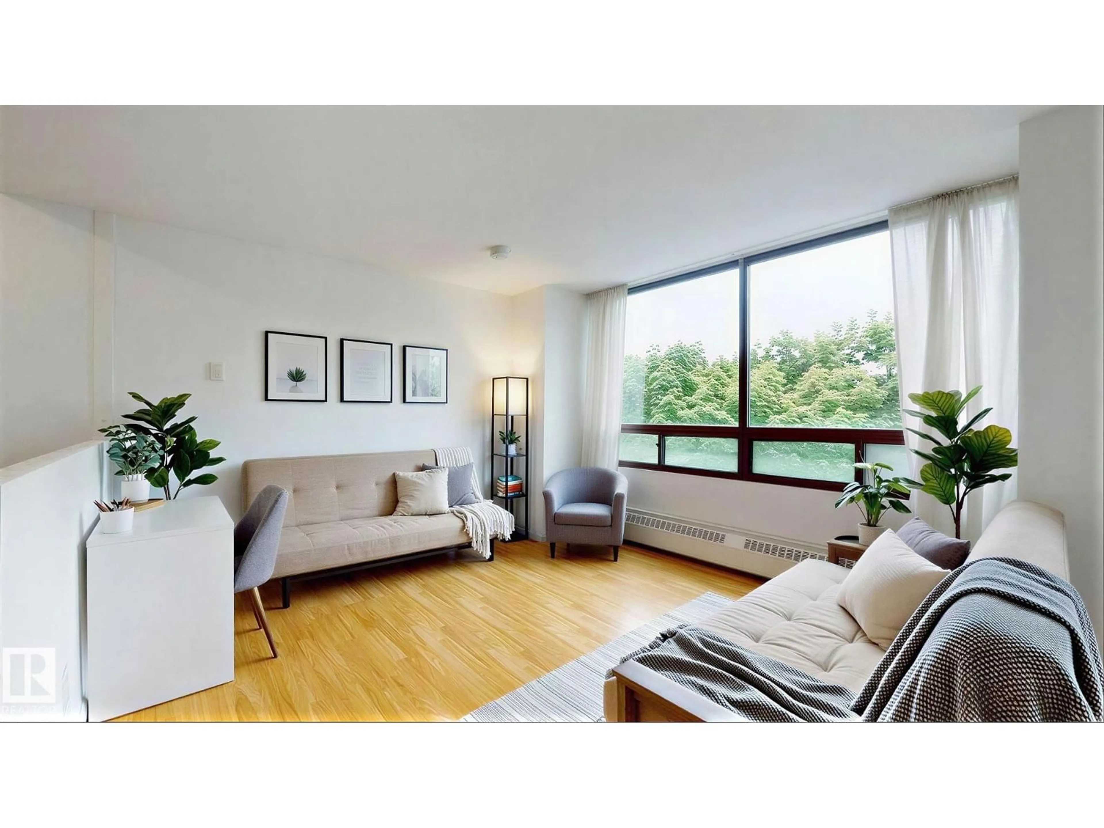 Living room with furniture, wood/laminate floor for #417 - 10160 114 ST, Edmonton Alberta T5K2L2