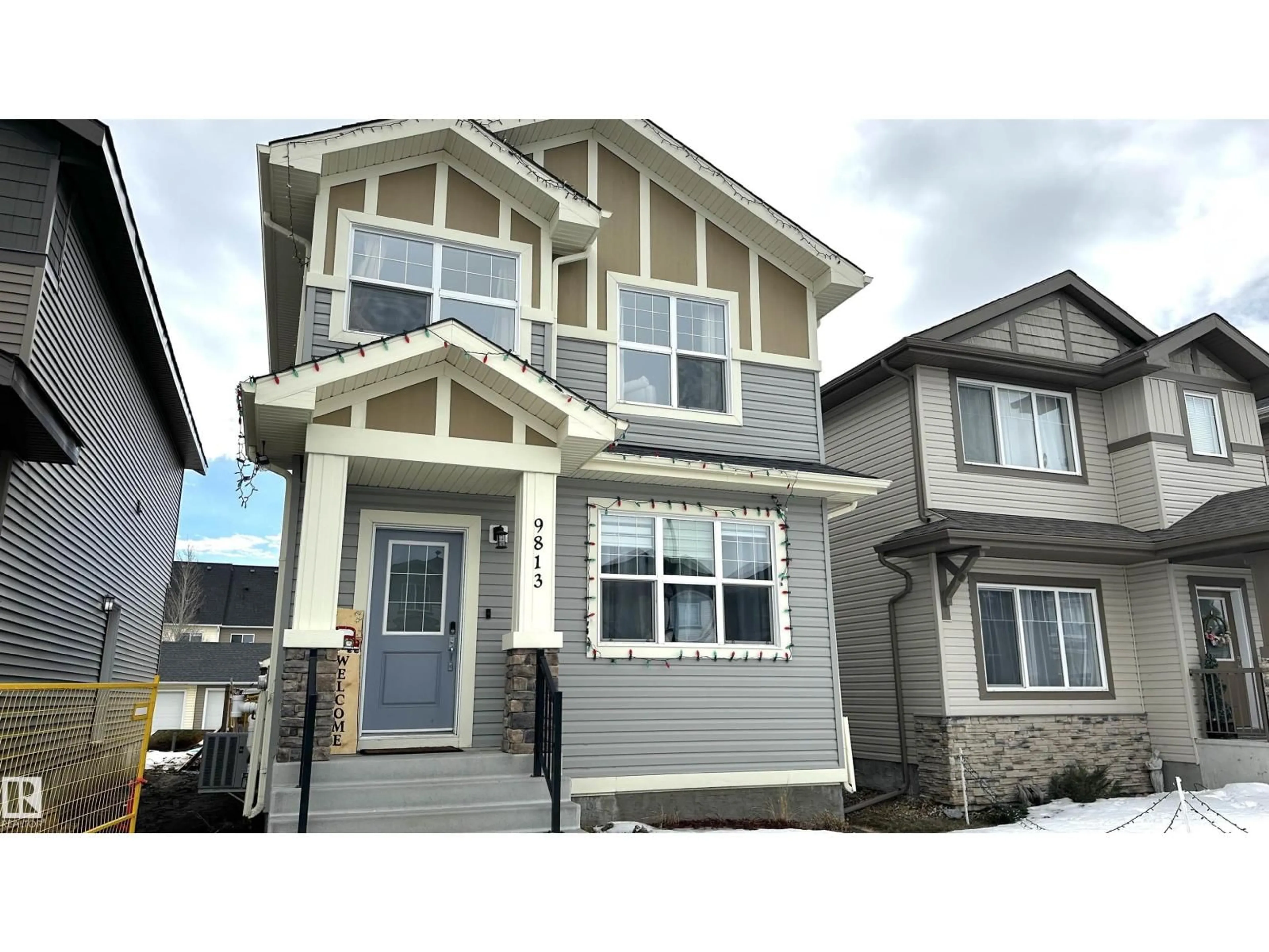 Home with vinyl exterior material, street for 9813 106, Morinville Alberta T8R2P1