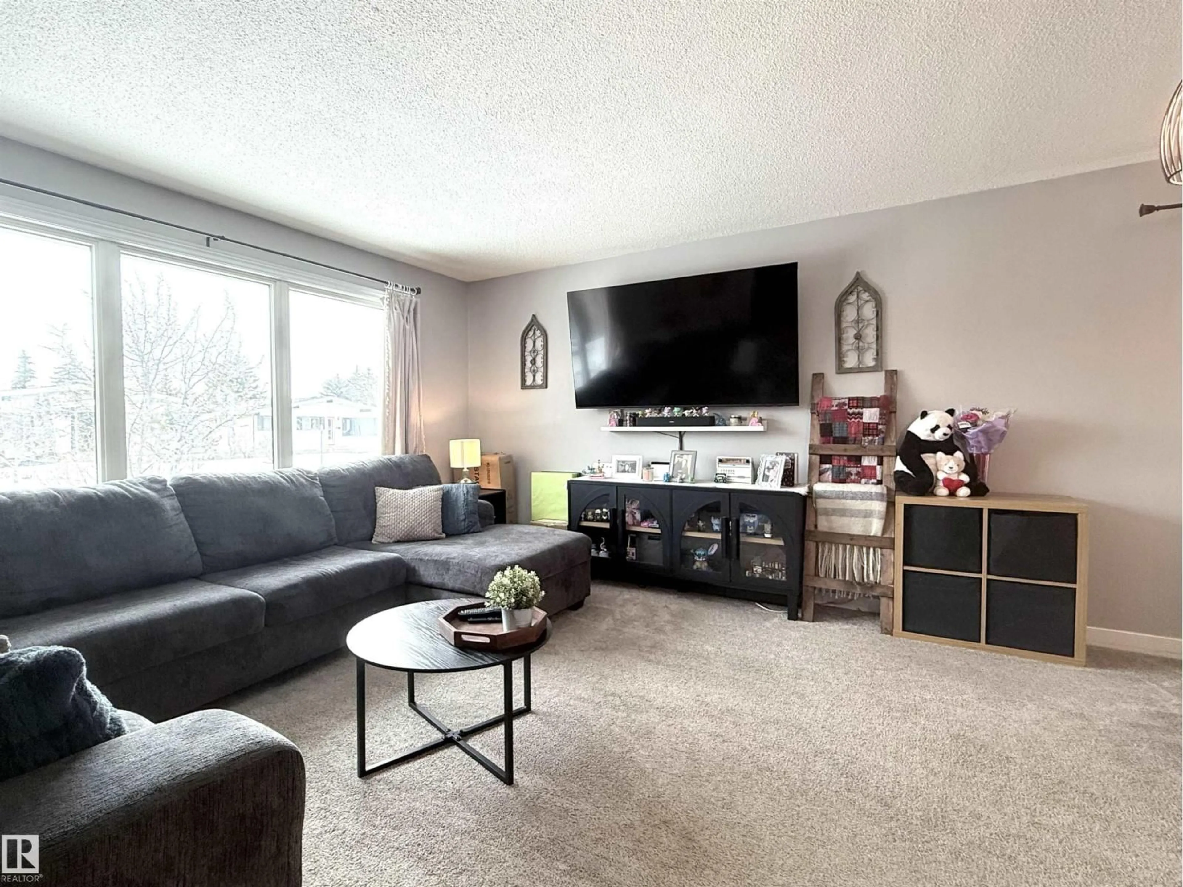 Living room with furniture, unknown for 3912 108 ST, Edmonton Alberta T6J1B9