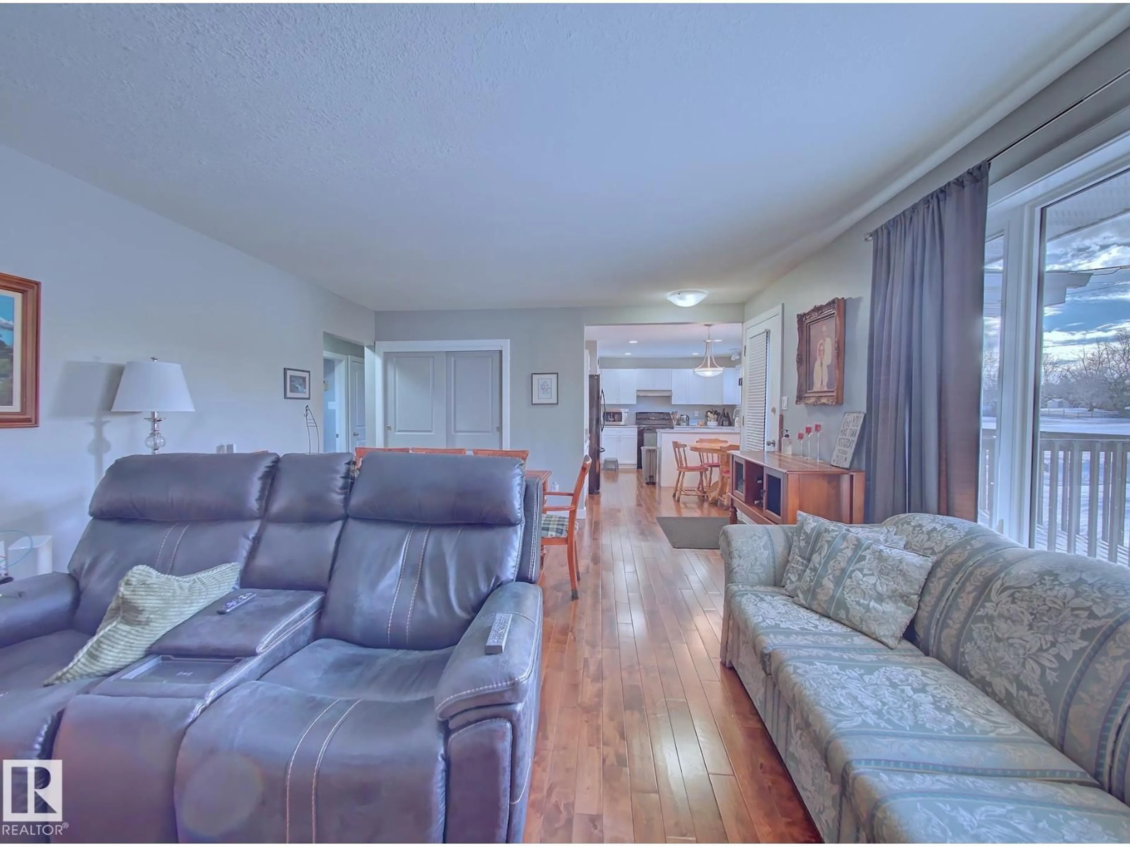 Living room with furniture, wood/laminate floor for 5015 51 AV, Bruderheim Alberta T0B0S0