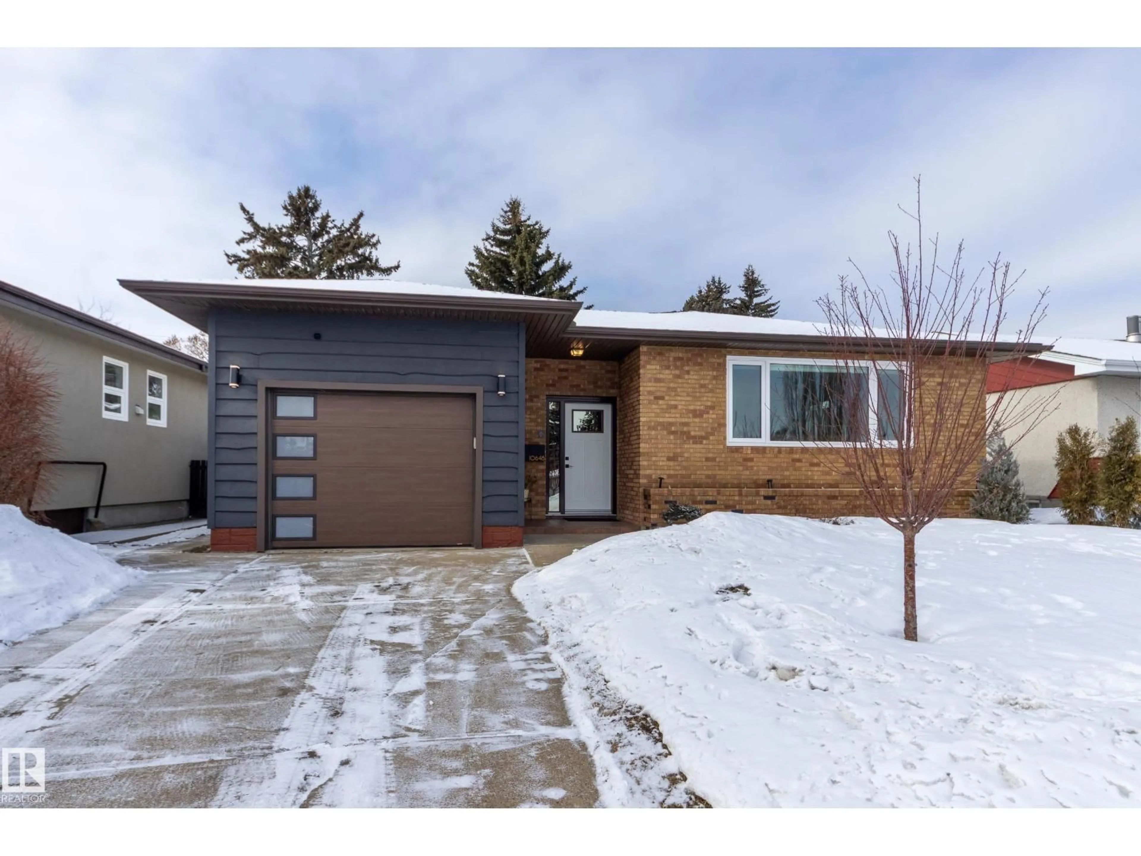 Home with brick exterior material, street for 10648 75 ST, Edmonton Alberta T6A2Z9