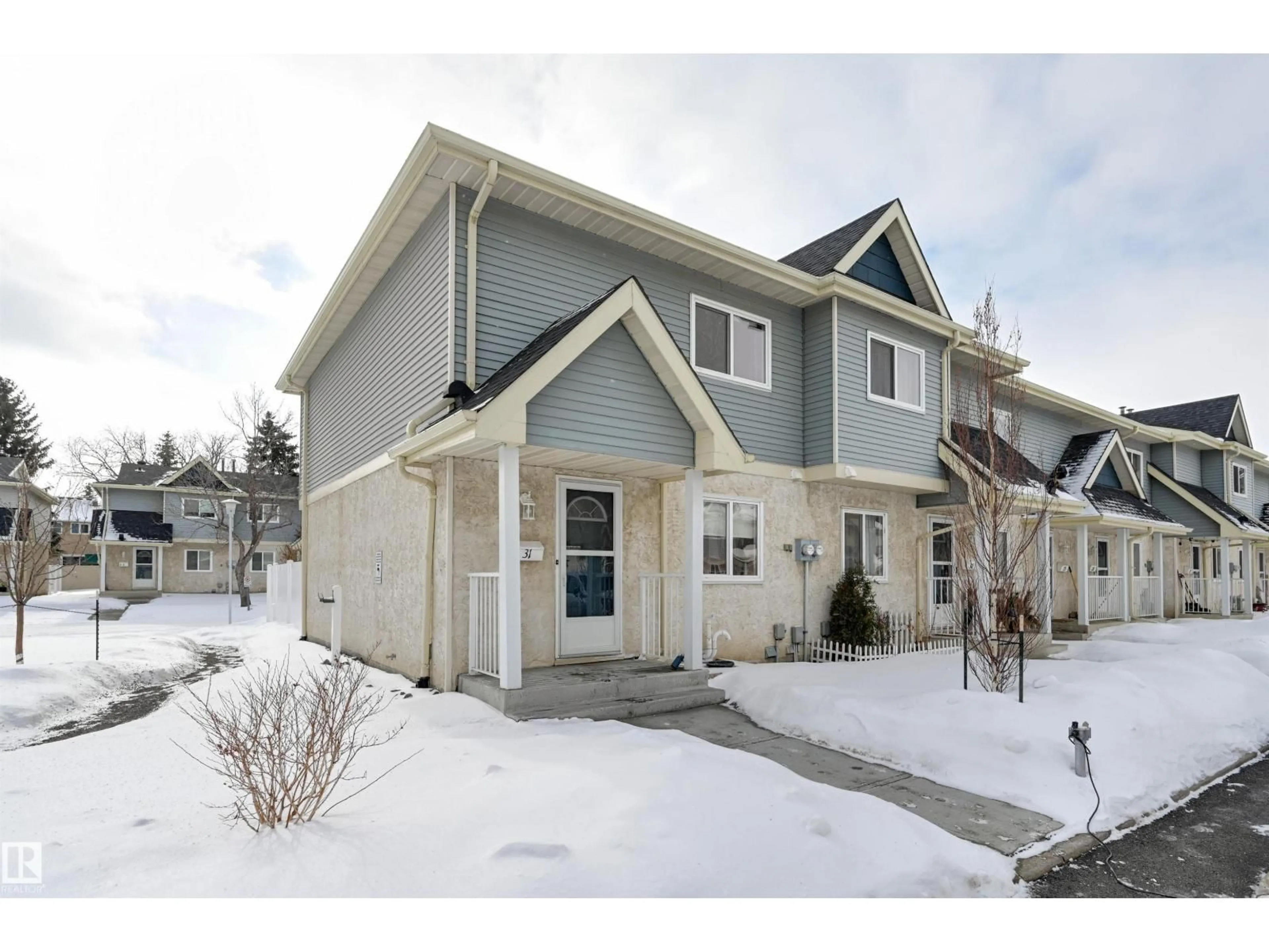 Home with vinyl exterior material, street for #31 - 9619 180 ST NW, Edmonton Alberta T5T4L9