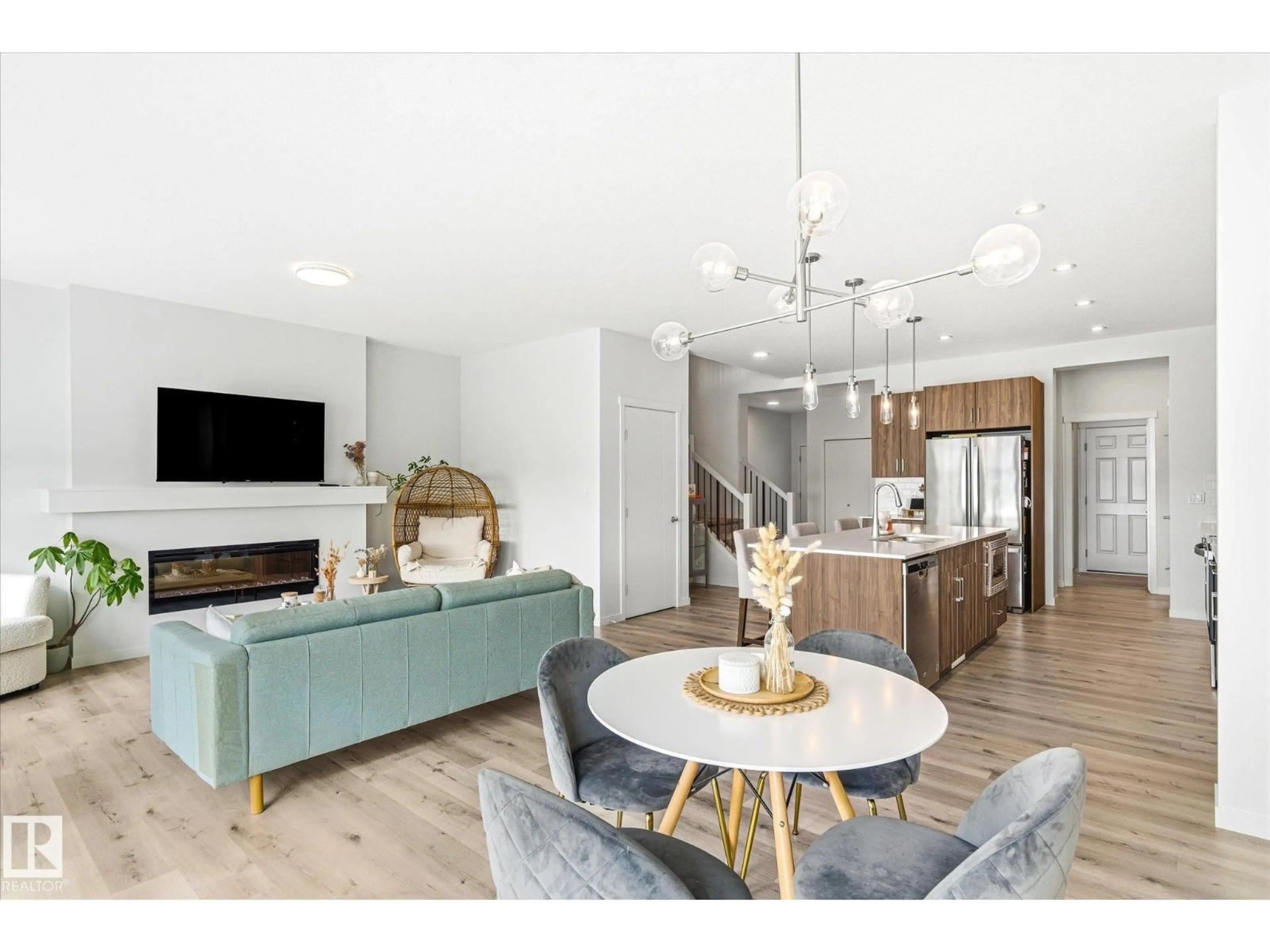 Open concept kitchen, wood/laminate floor for 20031 26 AV, Edmonton Alberta T6M1K3