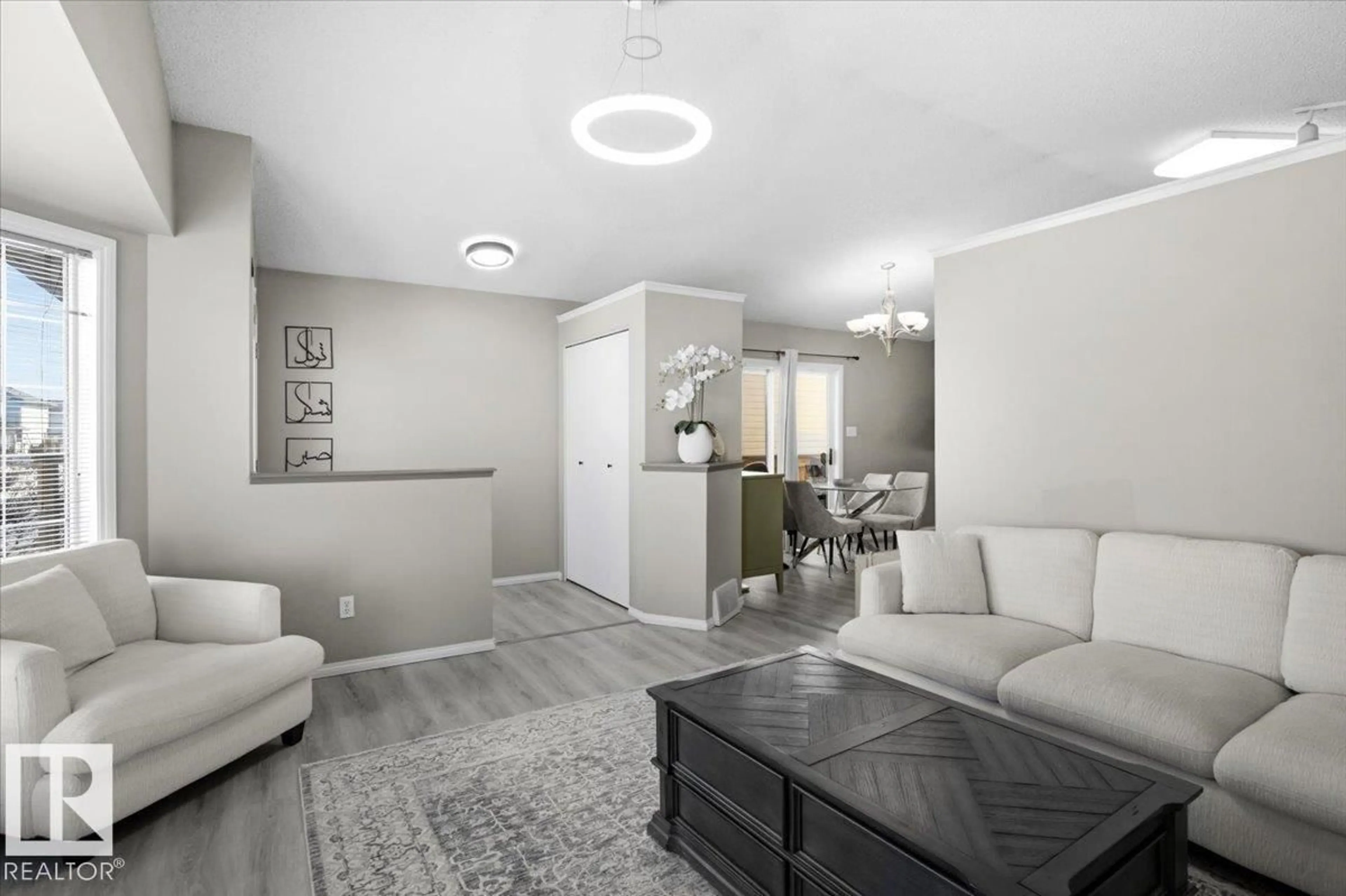 Living room with furniture, unknown for 5837 162A AV, Edmonton Alberta T5Y2W2