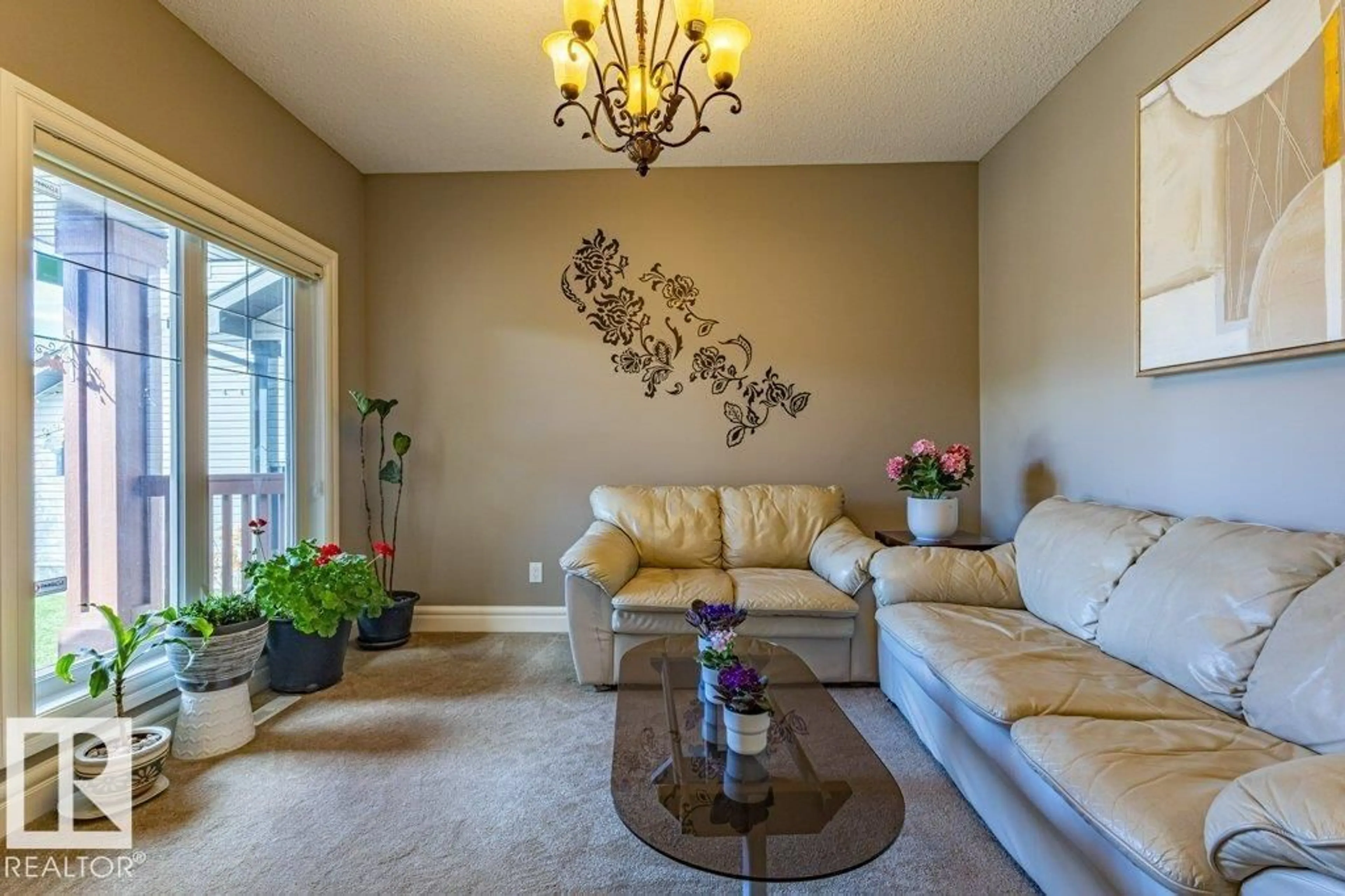 Living room with furniture, unknown for 11408 15 AV SW, Edmonton Alberta T6W0Z8