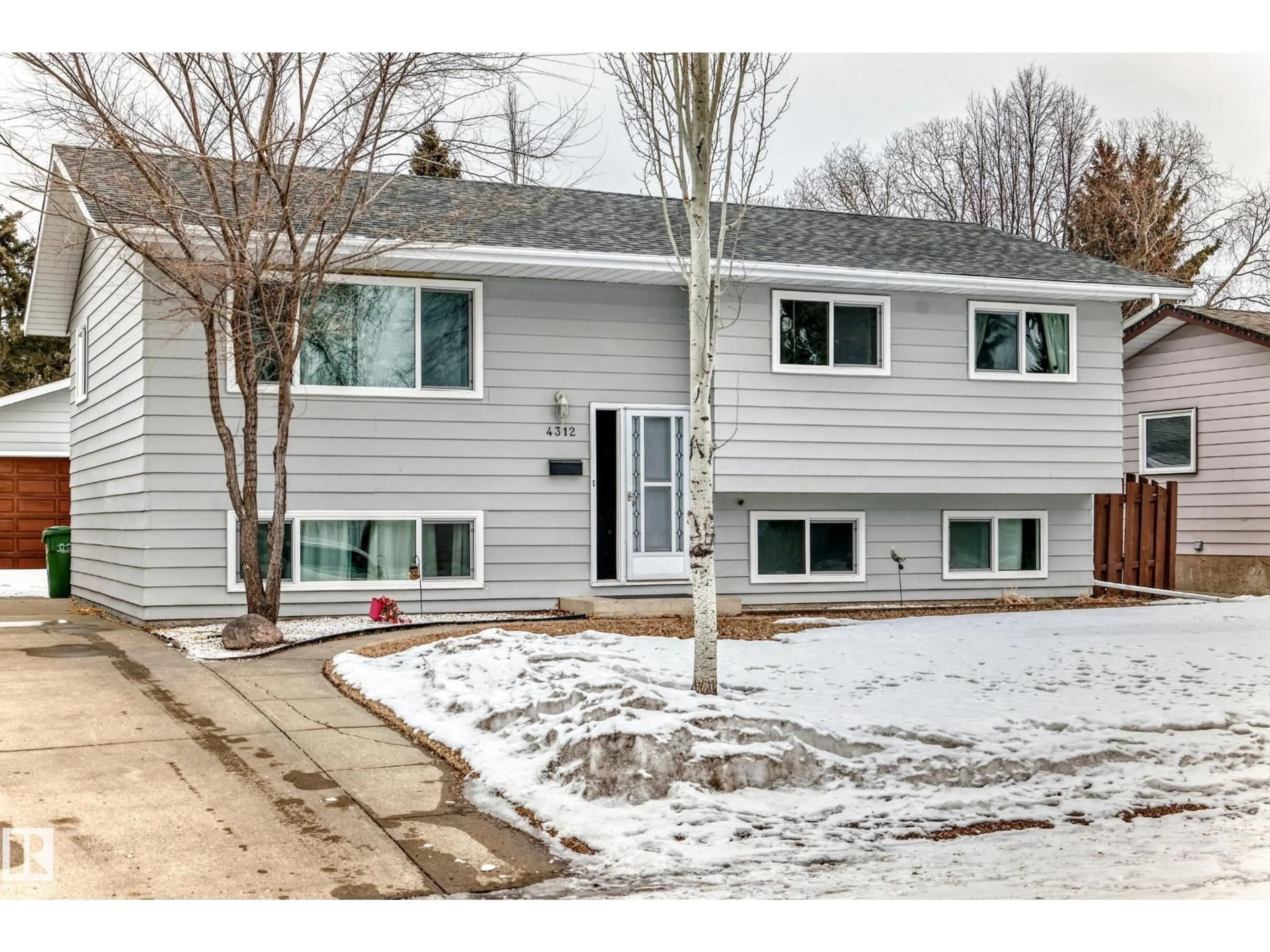 Home with vinyl exterior material, street for 4312 43 AV, Leduc Alberta T9E4R7