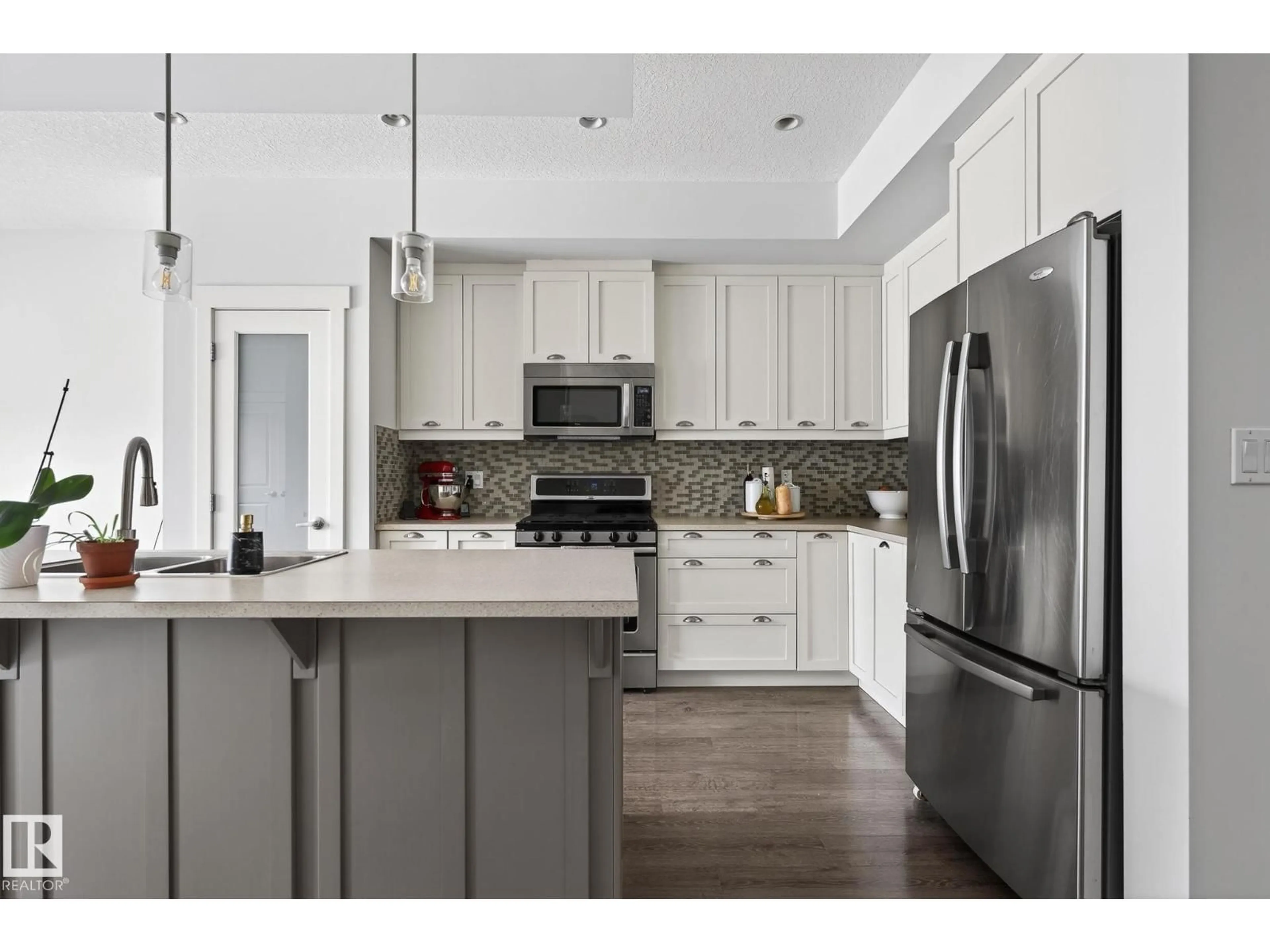 Open concept kitchen, unknown for NW - 9708 220 ST, Edmonton Alberta T5T4J9