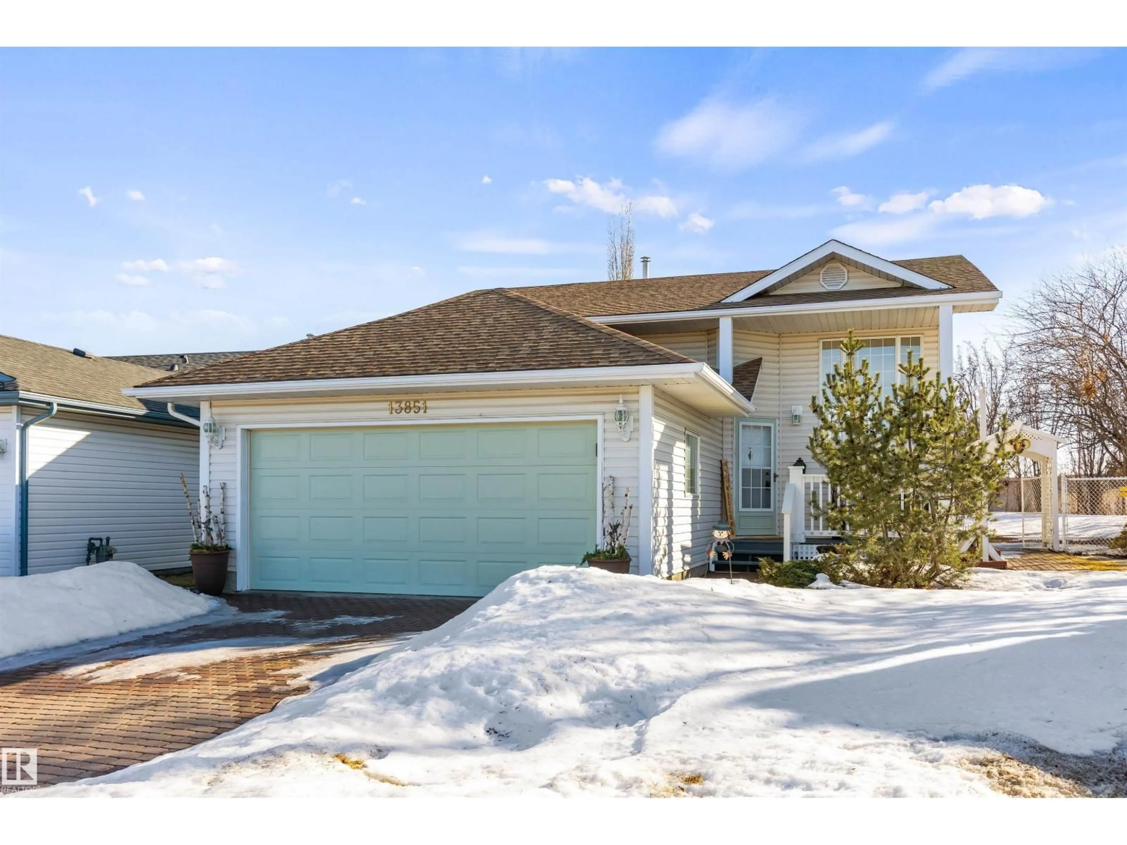 Home with vinyl exterior material, street for 13851 131 AV, Edmonton Alberta T5L5A6