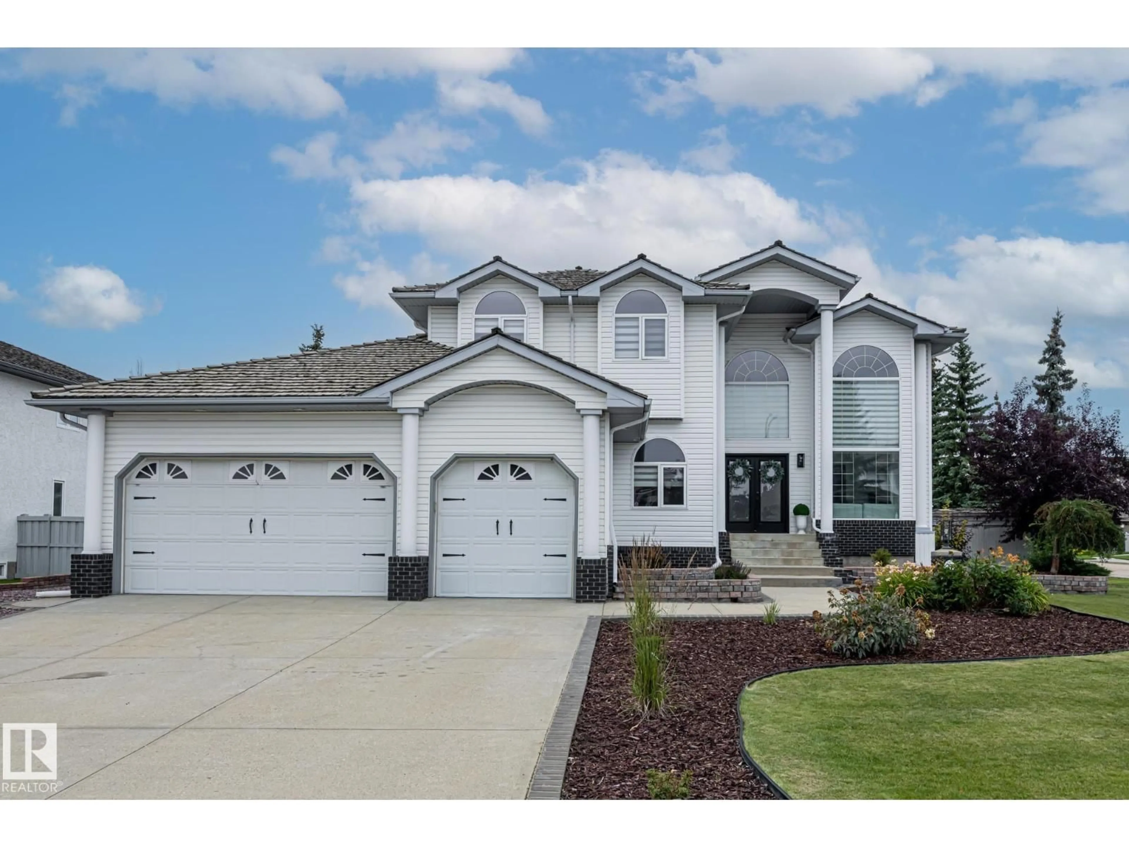 Home with vinyl exterior material, street for 36 - 36 RGE ROAD 233, Rural Strathcona County Alberta T8B1C9