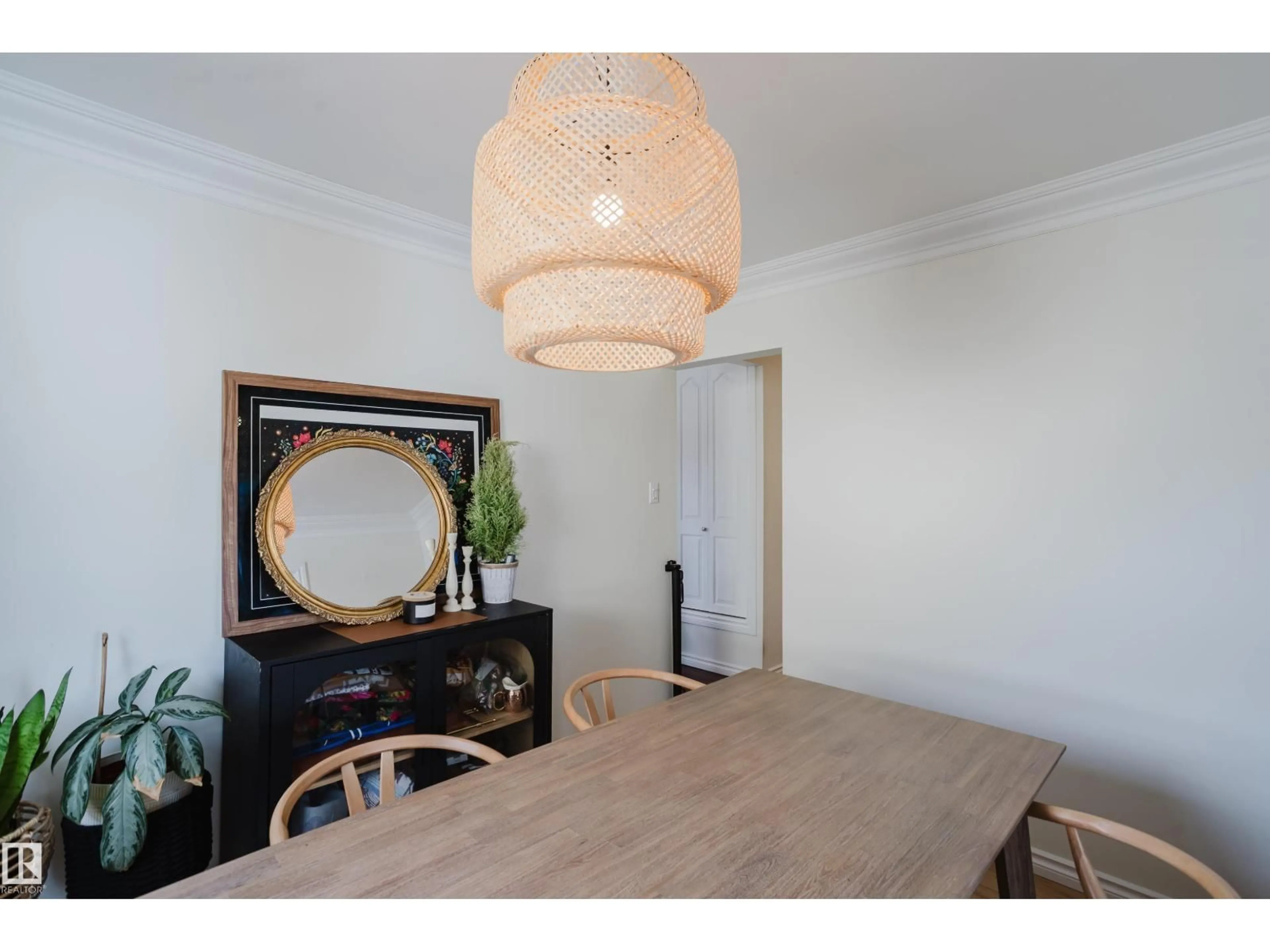 Dining room, wood/laminate floor for 6707 149A AV, Edmonton Alberta T5C2V8