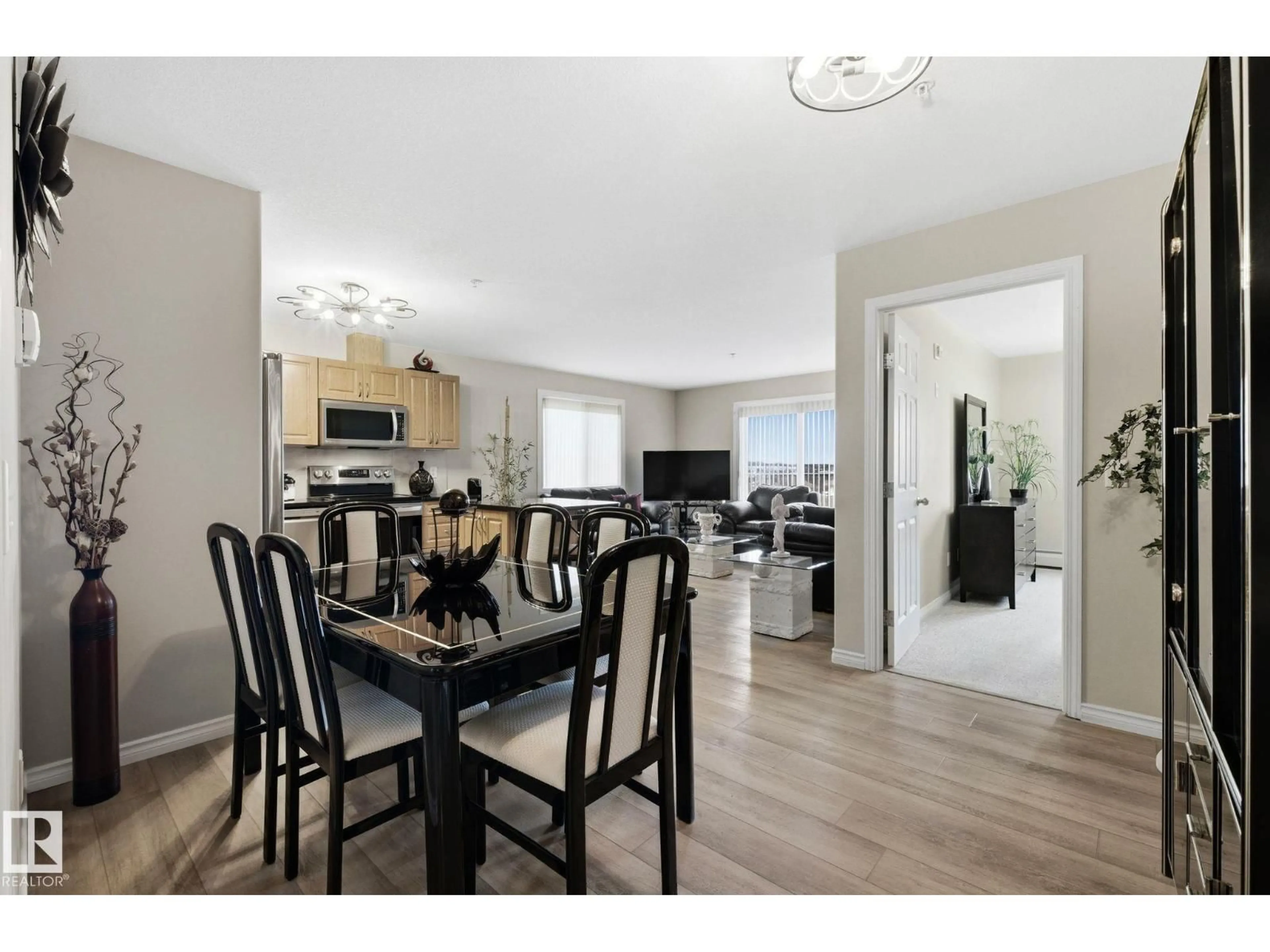 Open concept kitchen, wood/laminate floor for #504 - 9945 167 ST, Edmonton Alberta T5P0K5